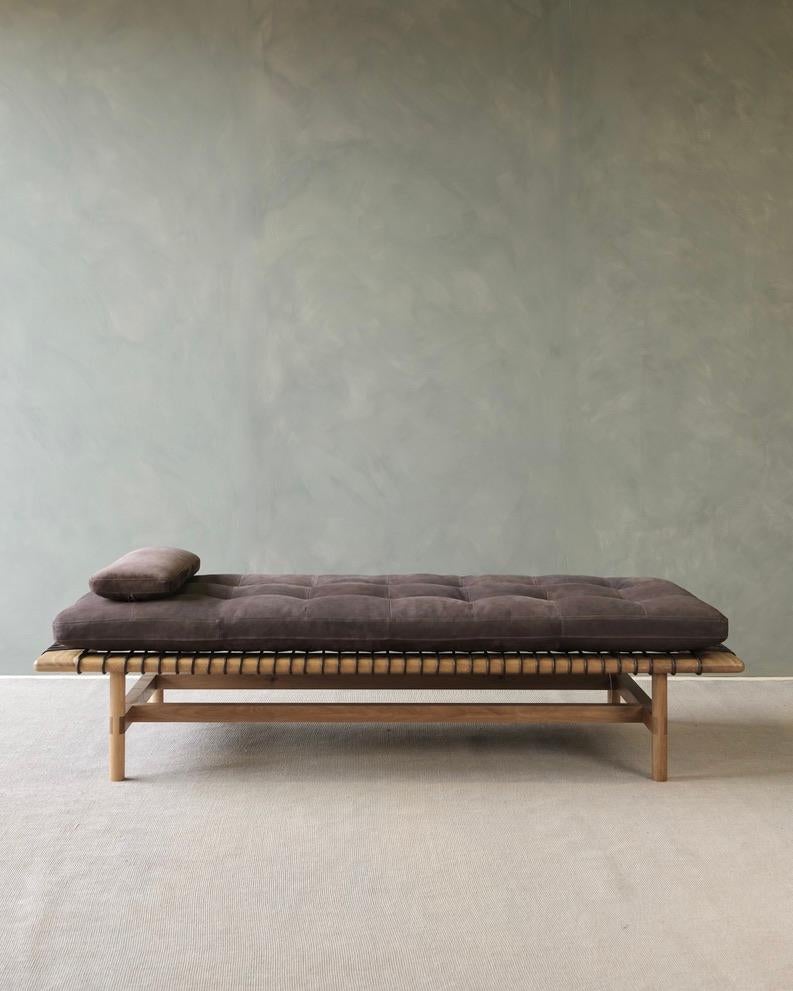 Drawing on our expertise in traditional joinery and leatherwork, the Mesa daybed celebrates contemporary craftsmanship in its rich detail and gathering of techniques. Exposed on the corners and bridle joints on the legs accentuate the rich grain in