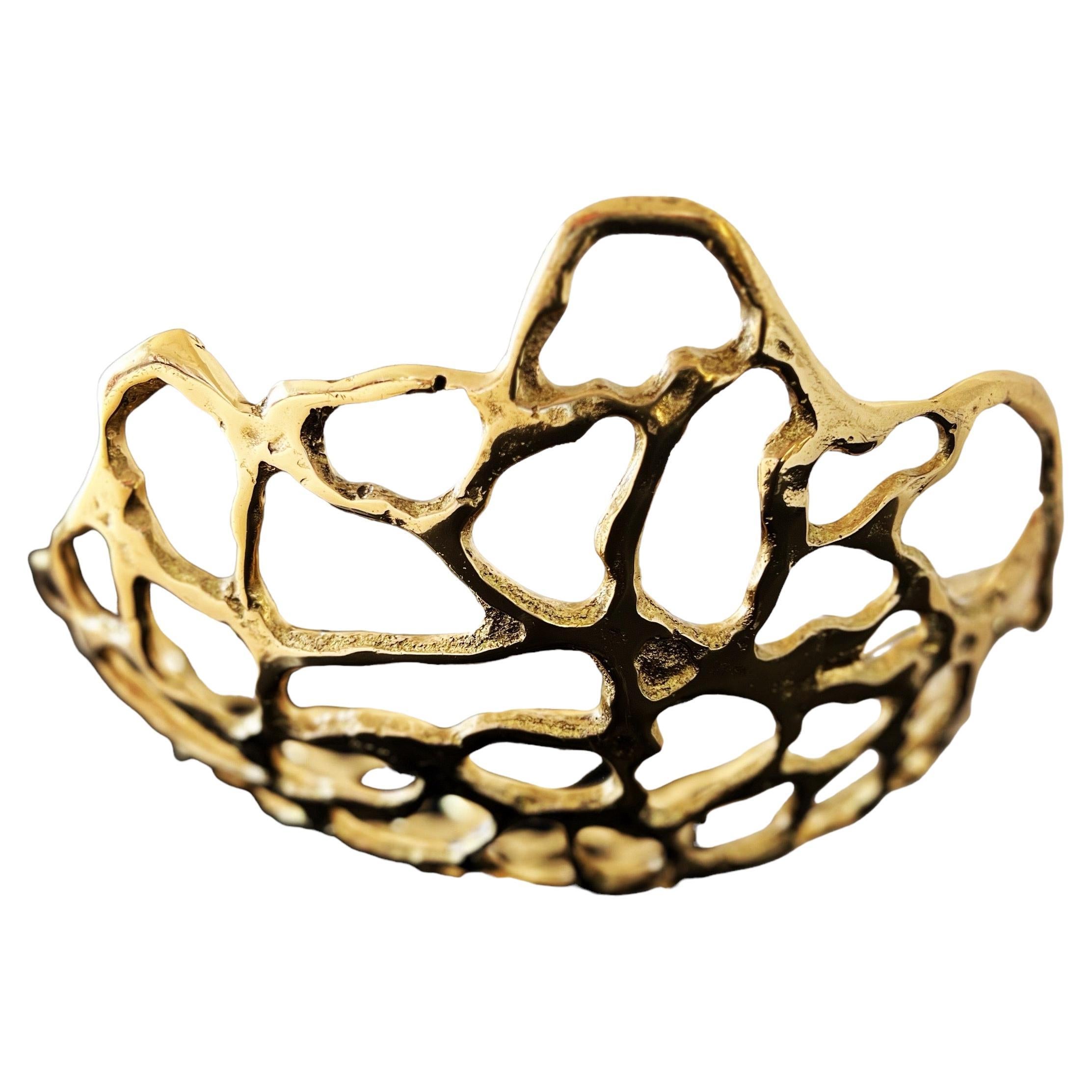 The decorative Brass Fruit Bowl was created by David Marshall, it is made of  sand cast brass.
Handmade, mounted and finished in our foundry and workshop in Spain from recycled materials.
Certified authentic by the Artist David Marshall with his
