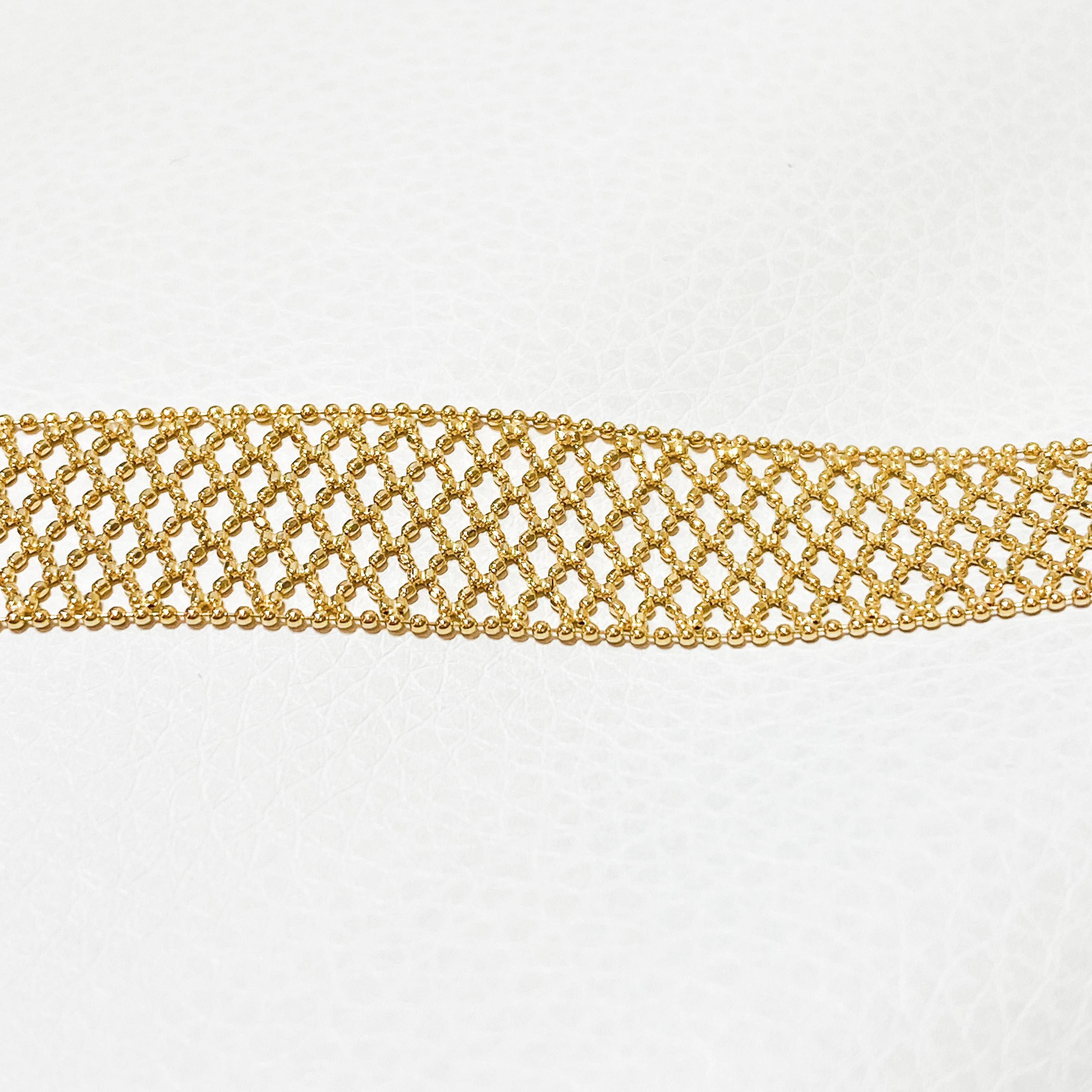 This spectacular bracelet is made of pure 18 karat yellow gold. The bracelet is in pristine condition and has never been worn.  It measures 7.25 inches long and can be worn by almost any size woman’s wrist.
Please check out our other listing for