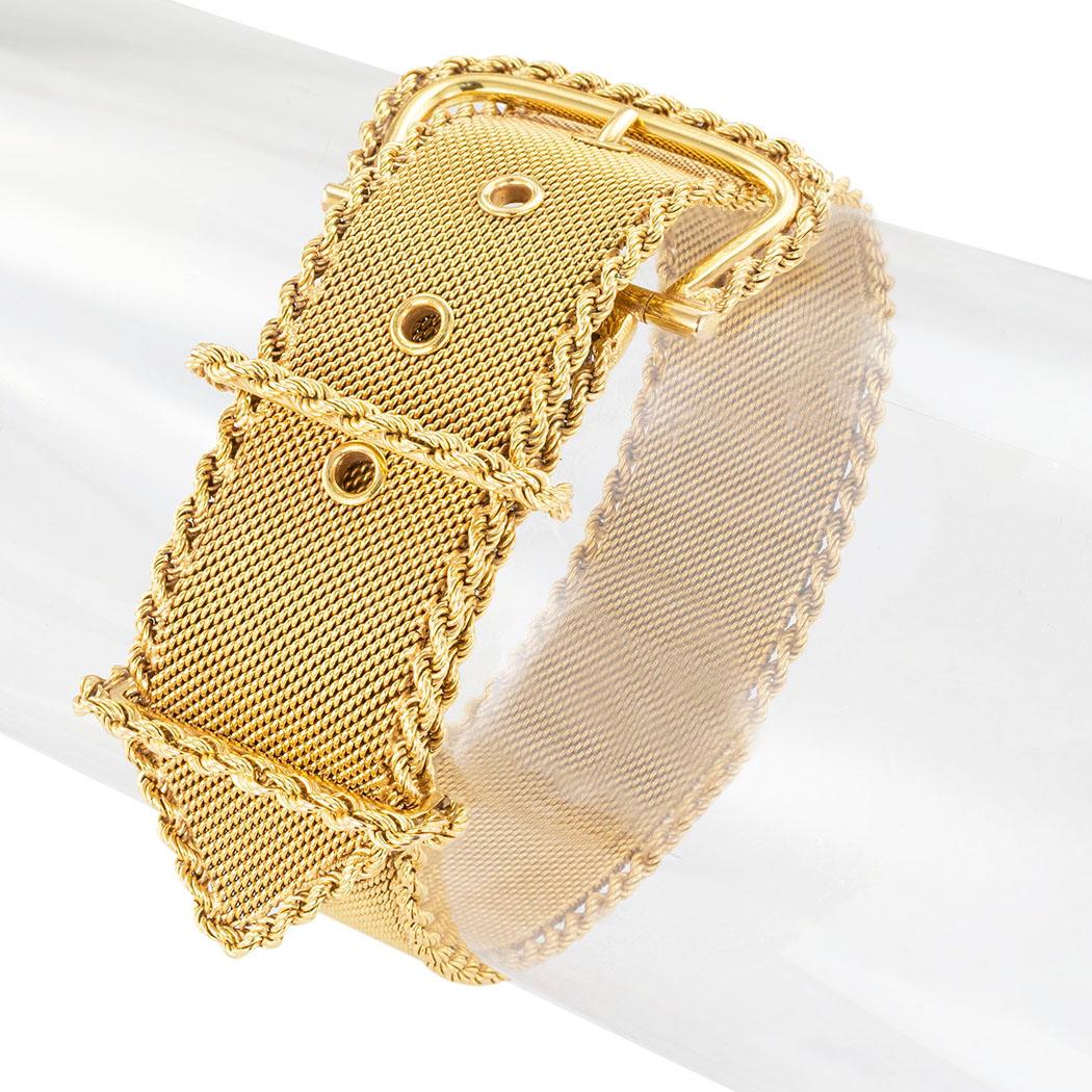 Mesh yellow gold buckle and adjustable strap bracelet circa 1960. 

We are here to connect you with beautiful and affordable antique and estate jewelry.

SPECIFICATIONS:

Contact us right away if you have additional questions.

METAL:  18-karat