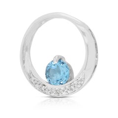 Hipnotizante Colgante de Topacio Azul y Diamante de 0,43 ct en Oro Blanco de 18 quilates