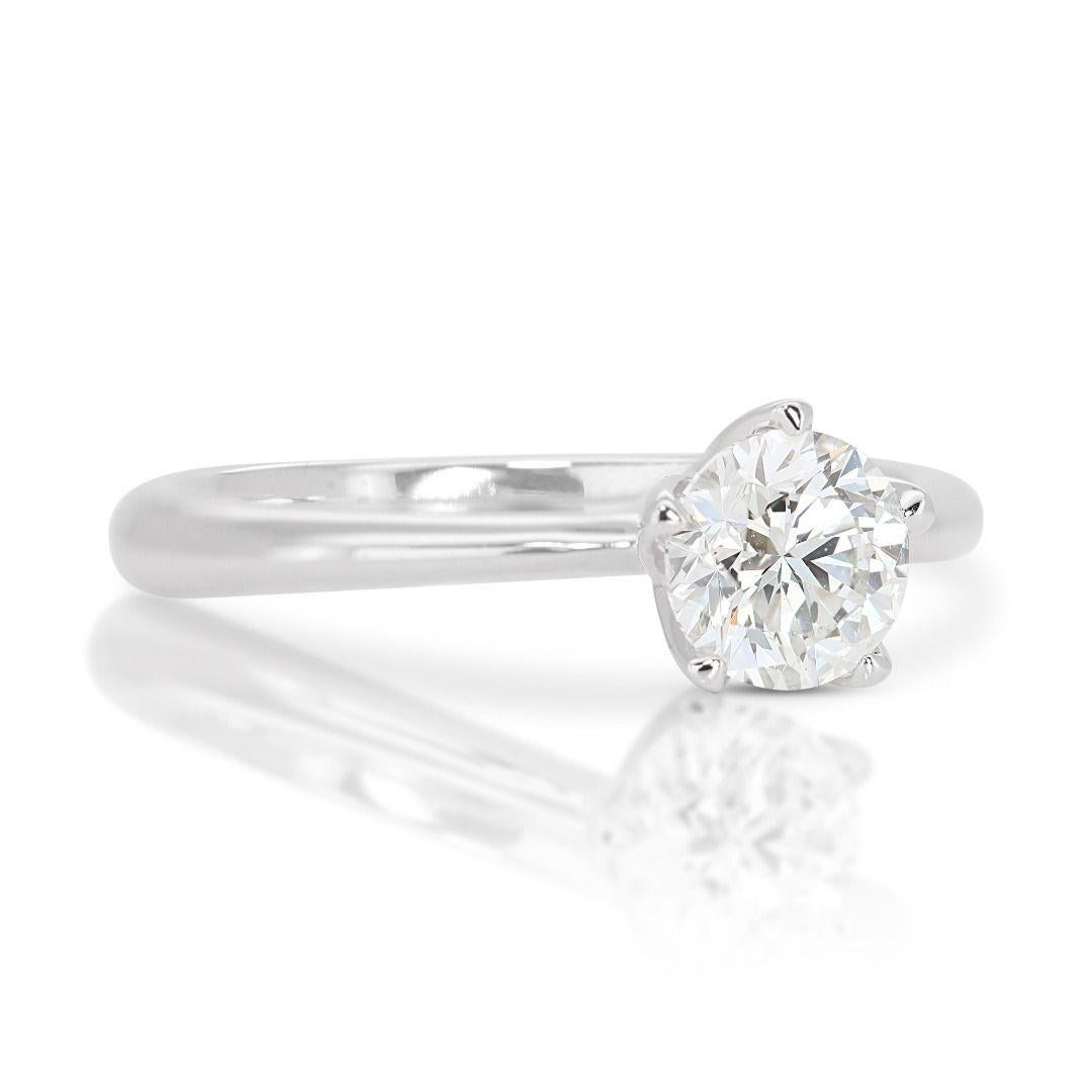 Round Cut Mesmerizing 0.53ct Solitaire Diamond Ring set in Gleaming 18K White Gold For Sale