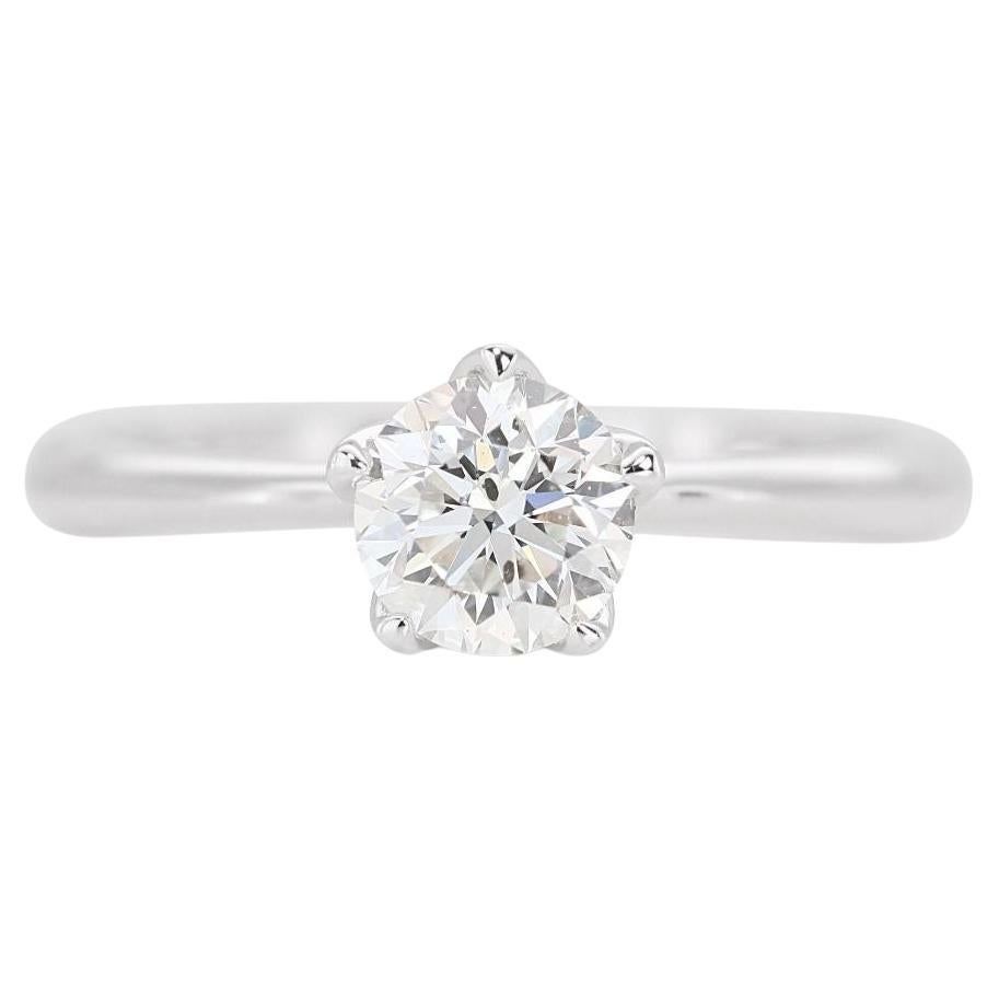 Mesmerizing 0.53ct Solitaire Diamond Ring set in Gleaming 18K White Gold