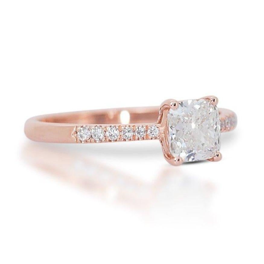 This isn't just a ring; it's a canvas painted with captivating fire. A dazzling 1-carat cushion brilliant diamond takes center stage, its G-H color radiating refined elegance, enhanced by VS1-VS2 clarity that whispers a story of strength and beauty.