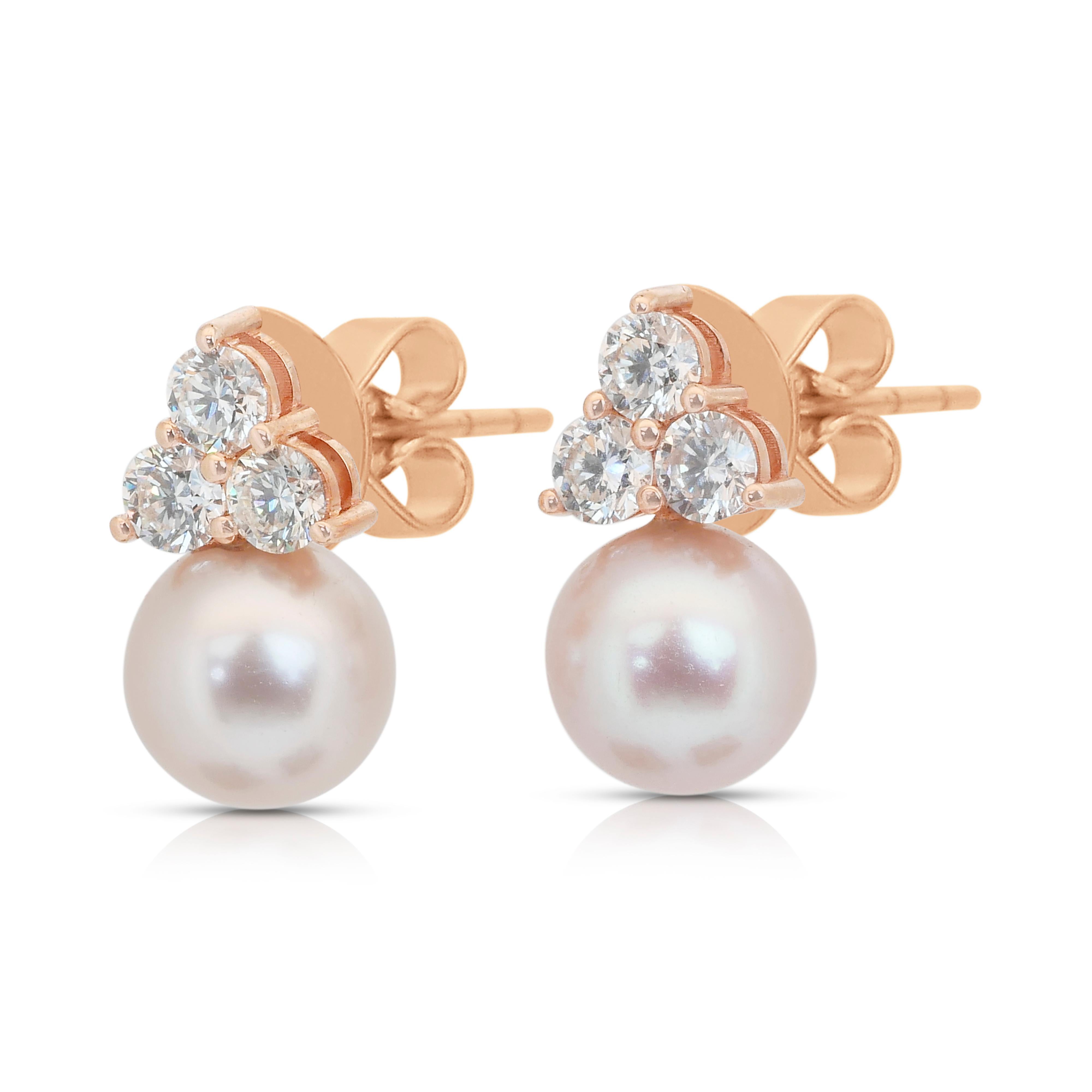 Mesmerizing 11.19ct Fresh Water Cultured Pearls and Diamonds Earrings in 18k Rose Gold - IGI Certified

Elegant and feminine, these 18K rose gold earrings showcase two exquisite light pink freshwater cultured pearls totaling 9.99ct. Their soft hue