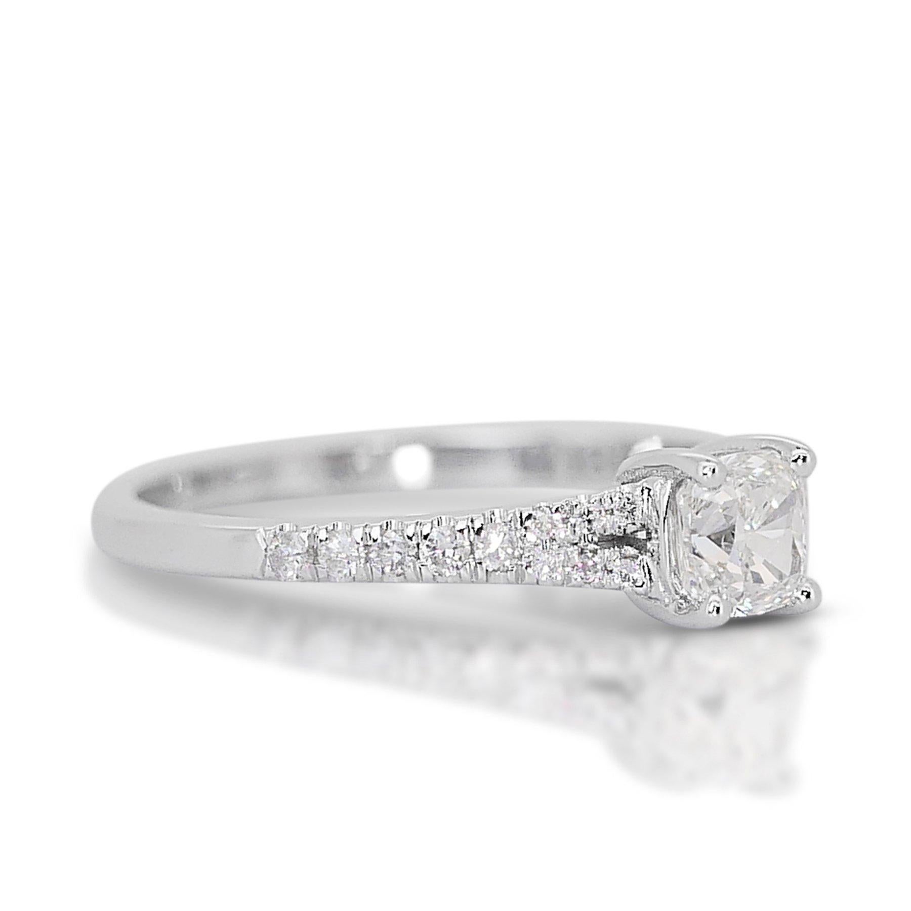 Mesmerizing 1.17ct Diamond Pave Ring in 18k White Gold - GIA Certified

Experience elegance with this exquisite diamond ring crafted from 18k white gold. The main stone is a 1.00-carat cushion-cut diamond, with a color grade that exudes a gentle