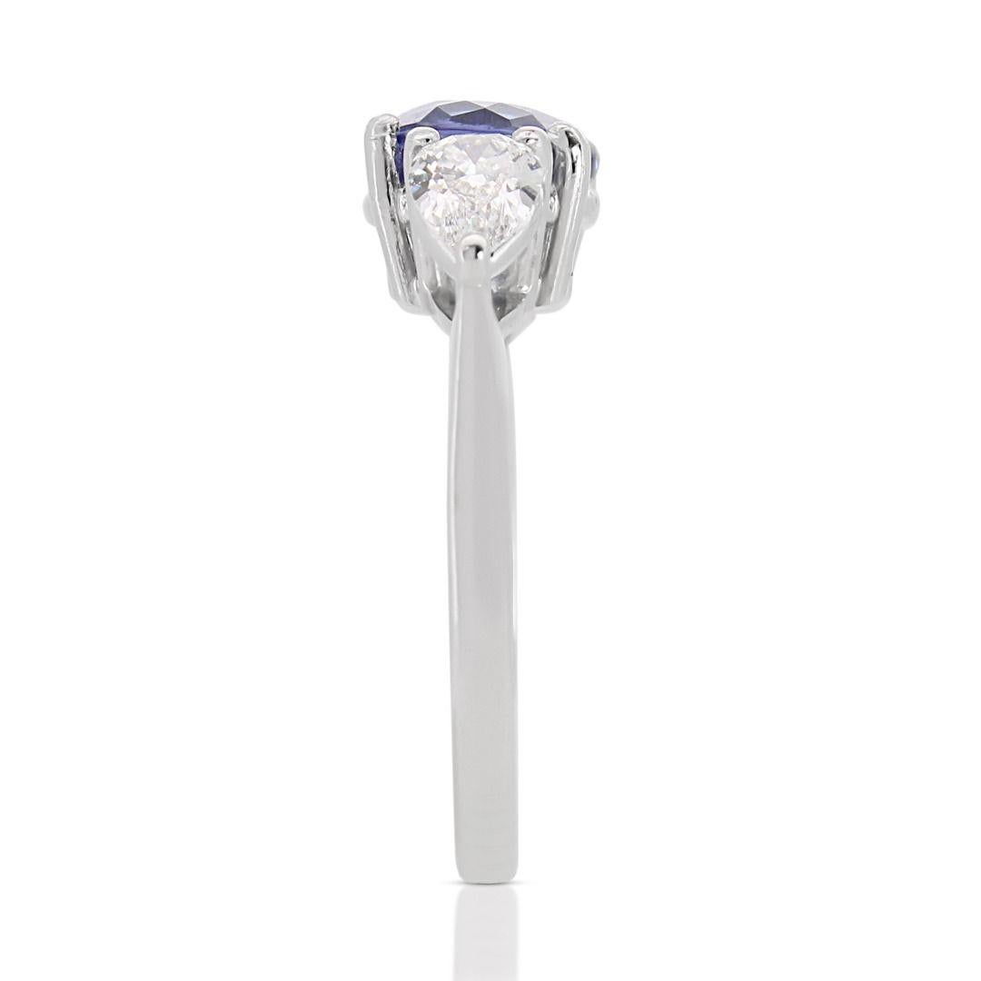 Mesmerizing 1.89ct Tanzanite Ring with Side Diamonds in Platinum In New Condition For Sale In רמת גן, IL