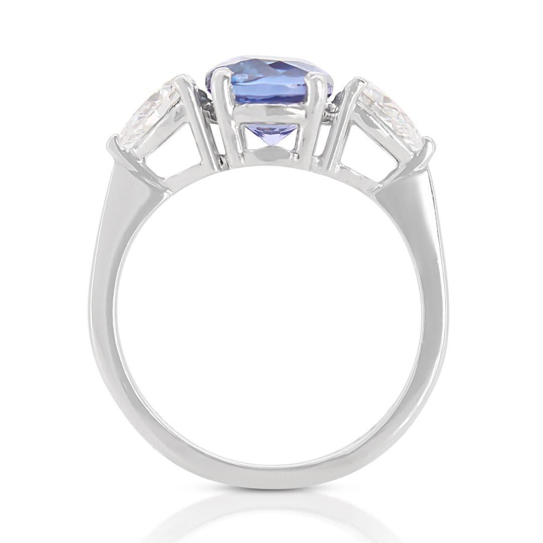 Women's Mesmerizing 1.89ct Tanzanite Ring with Side Diamonds in Platinum For Sale