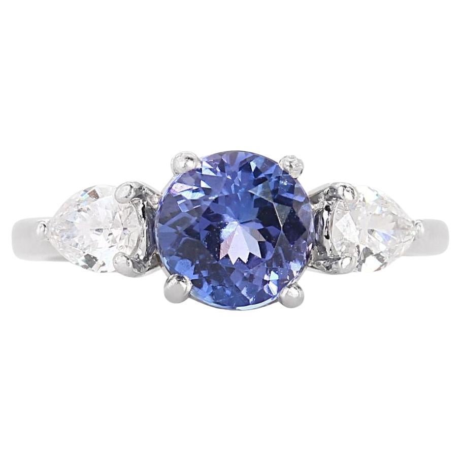 Mesmerizing 1.89ct Tanzanite Ring with Side Diamonds in Platinum For Sale