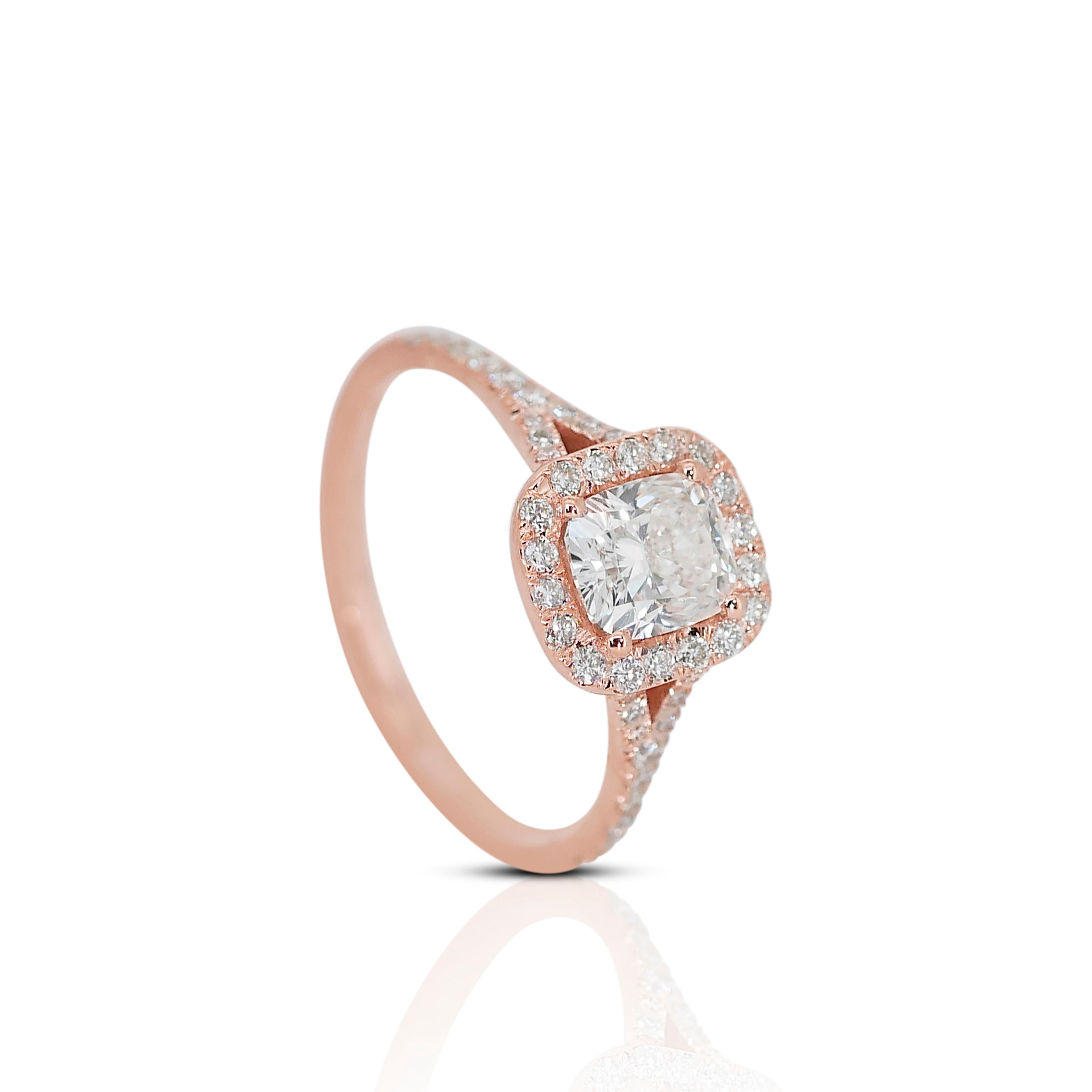 Mesmerizing 18K Rose Gold Ideal Cut Pave Natural Diamond Ring w/1.27ct

This mesmerizing piece features a central 1.01 carat cushion modified brilliant diamond. Accompanying this exquisite centerpiece are 24 round brilliant cut diamond side stones,