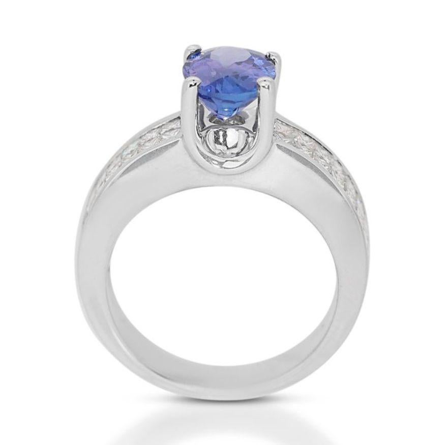 Mesmerizing 2.00 Carat Oval Mixed Cut Tanzanite Ring in 18K White Gold For Sale 1