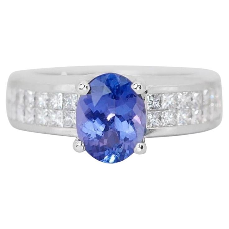 Mesmerizing 2.00 Carat Oval Mixed Cut Tanzanite Ring in 18K White Gold For Sale