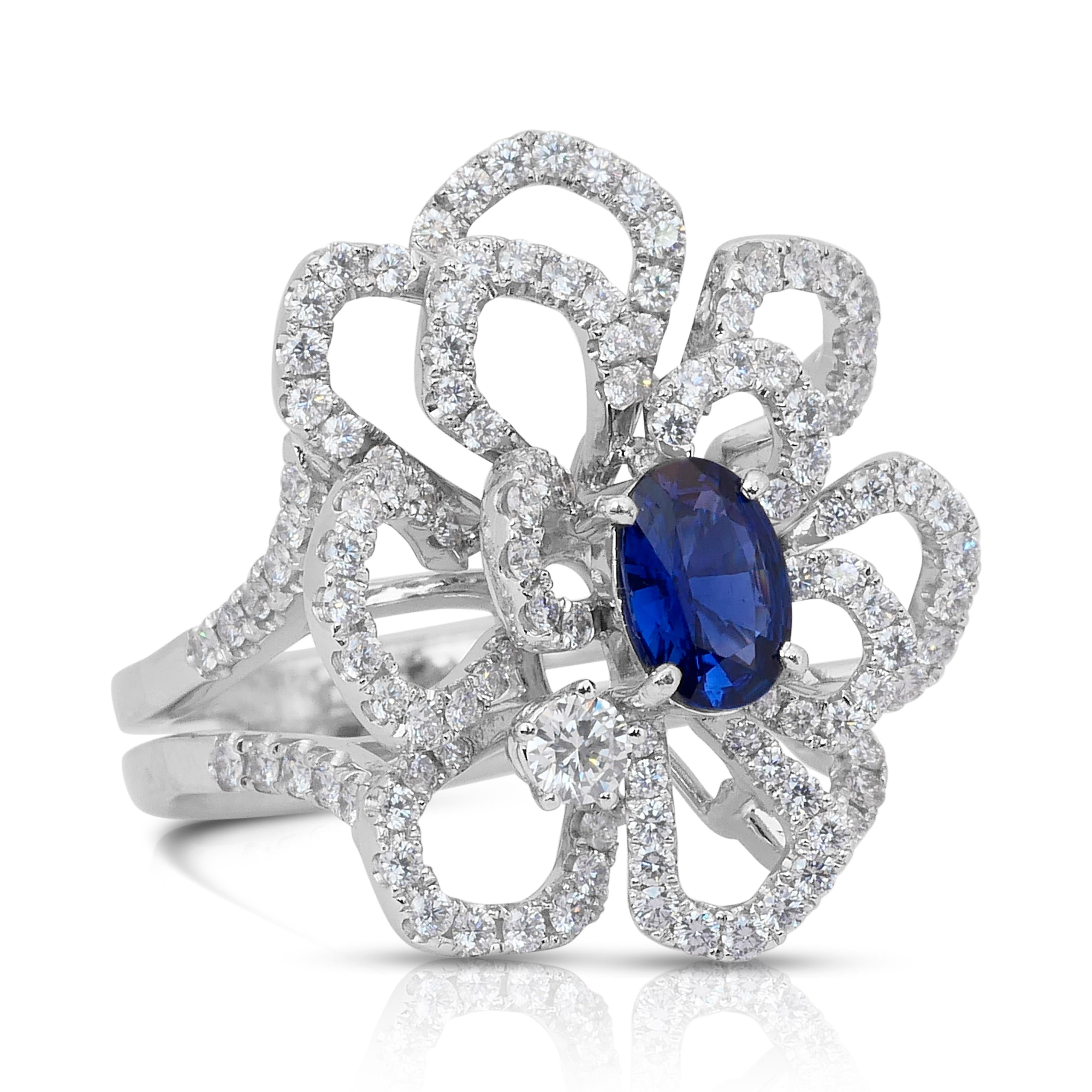 Bague en or blanc 18k avec saphir et diamants de 3,49ct - Certifiée IGI

Cette bague en or blanc 18 carats est une fusion étonnante de couleurs et de brillances royales. Elle est ornée d'un saphir bleu ovale de 1,01 carat, d'une élégance profonde et