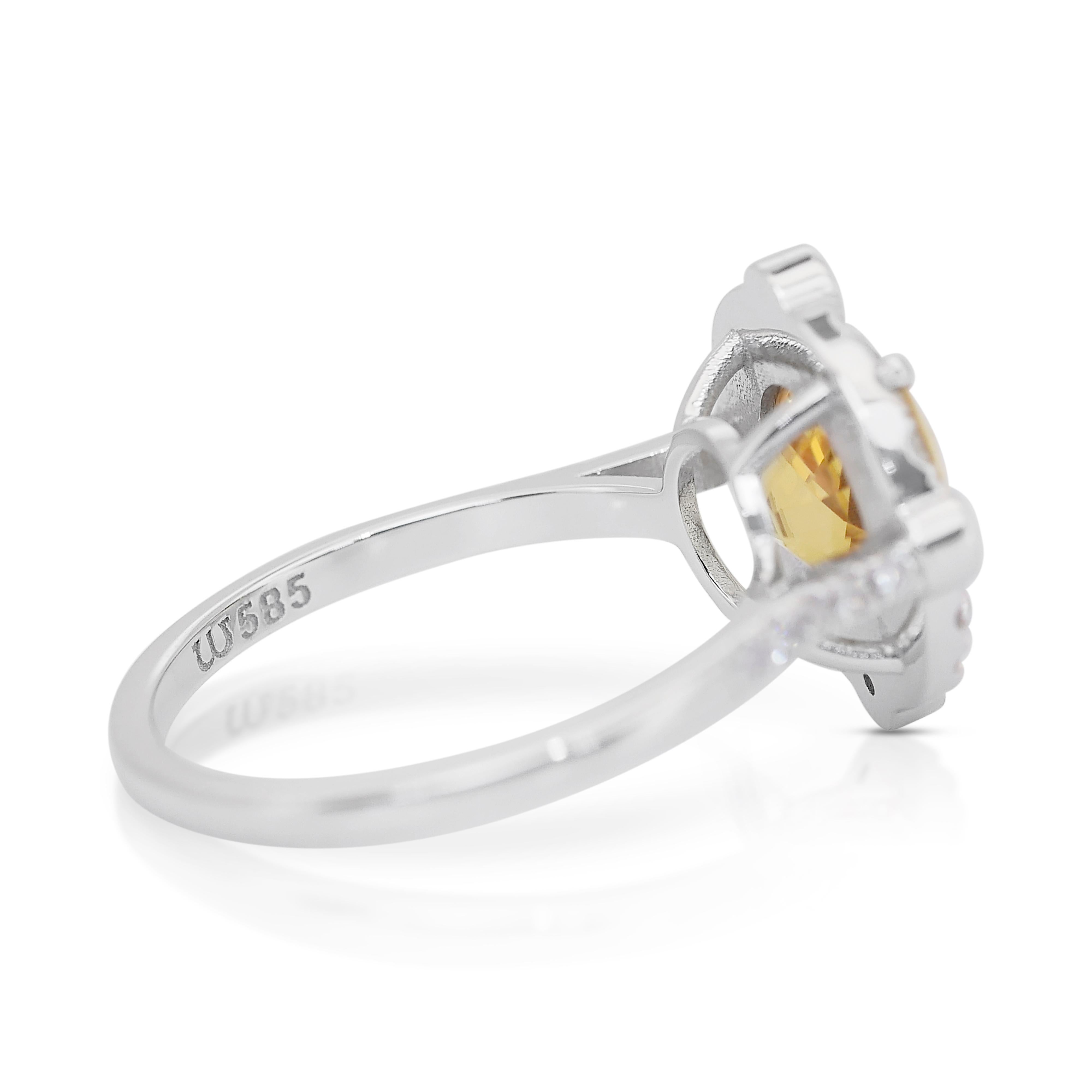 Magnifique bague en or blanc 14k avec saphir et diamants de 3,56ct - Certifiée IGI

Cette superbe bague à grappes en or blanc 14k met en valeur un magnifique saphir de 3,13ct, exhalant une sophistication et une élégance intemporelles. Accentuée par