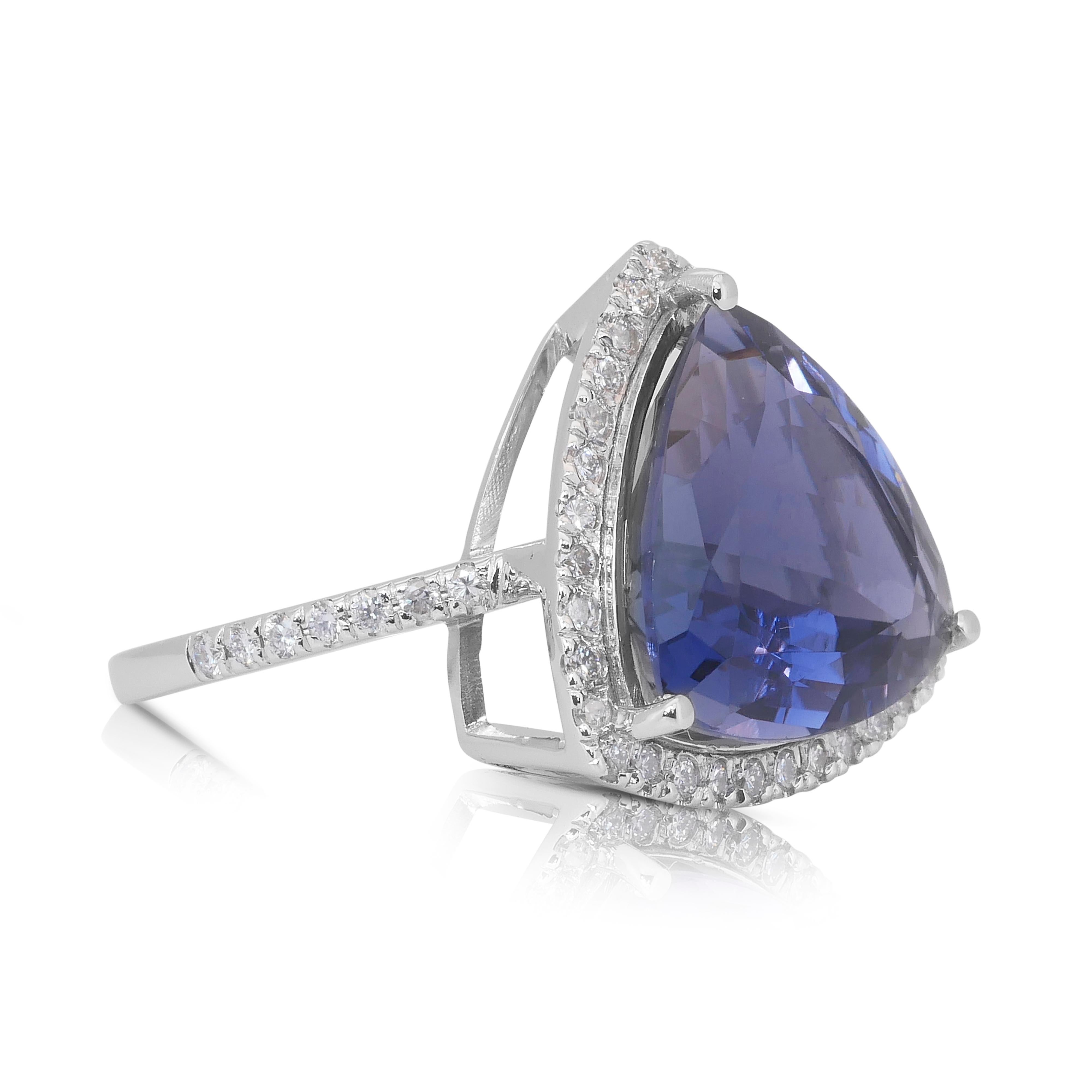 Mesmerizing 7.12ct Iolite and Diamonds Cocktail Ring in 14k White Gold - GIA Certified

Indulge in the captivating allure of this 14k white gold cocktail ring, featuring a stunning 6.54-carat triangular-cut iolite with a rich violet hue. This
