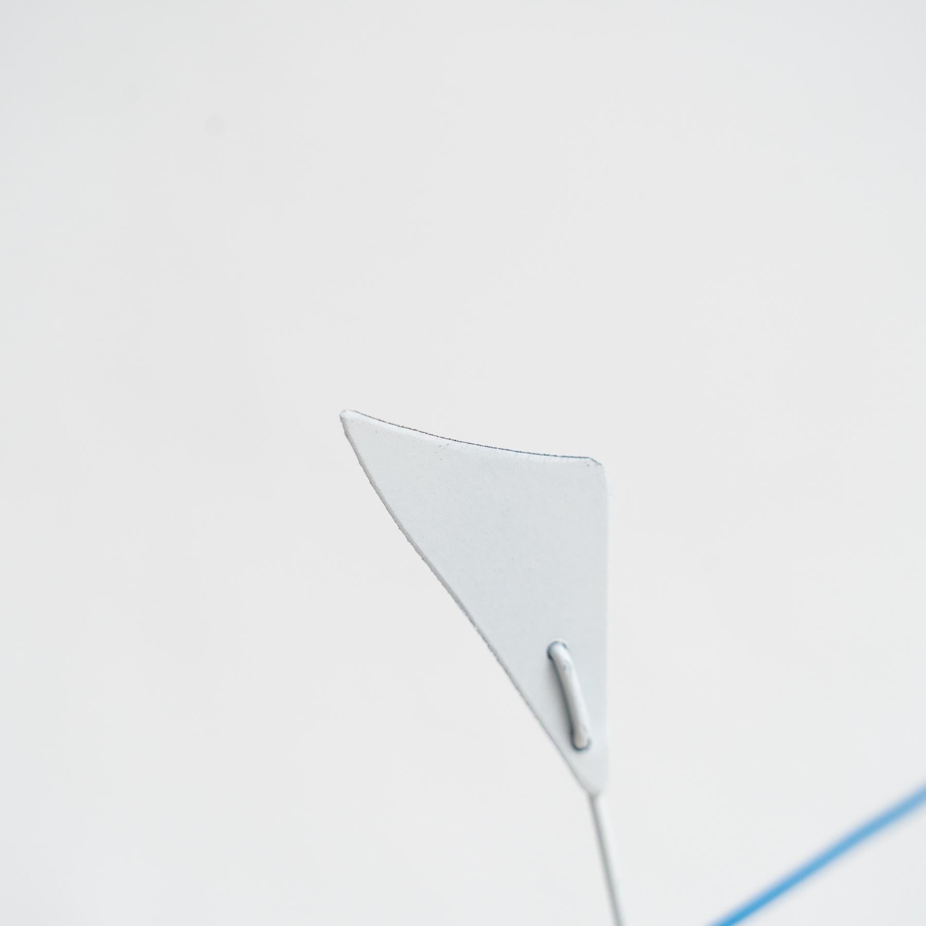 Mesmerizing Kinetics: Iron Sculpture - Painted Motion and Color 6