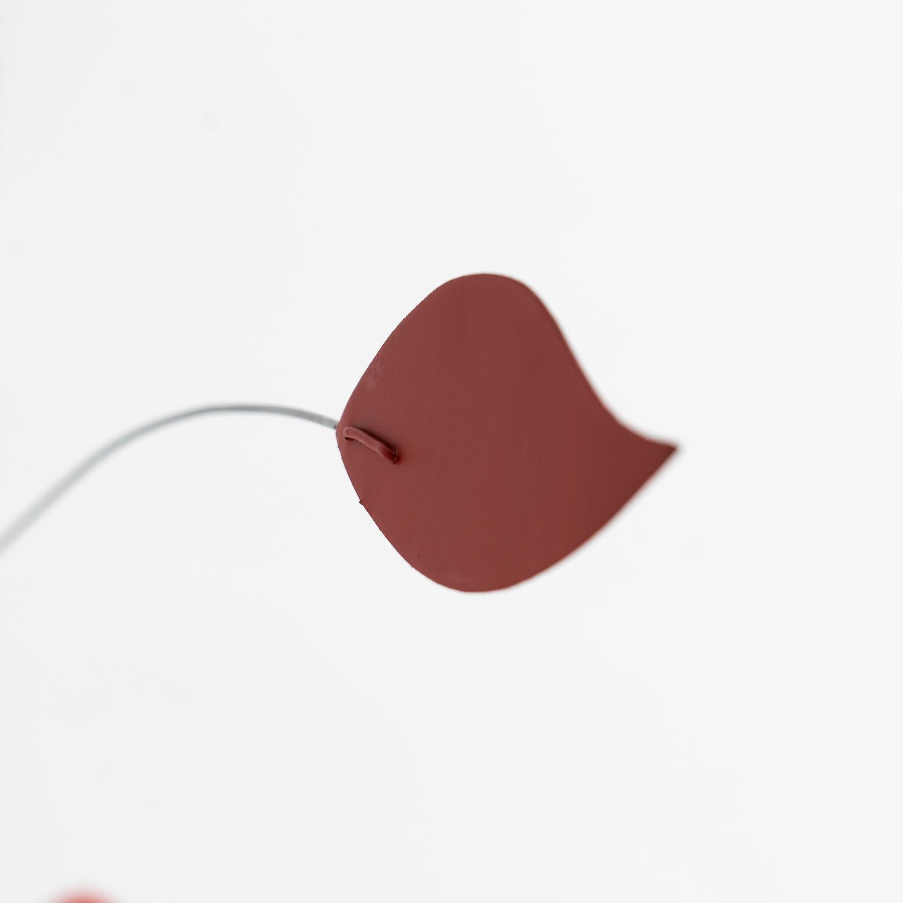 Mesmerizing Kinetics: Iron Sculpture - Painted Motion and Color 10