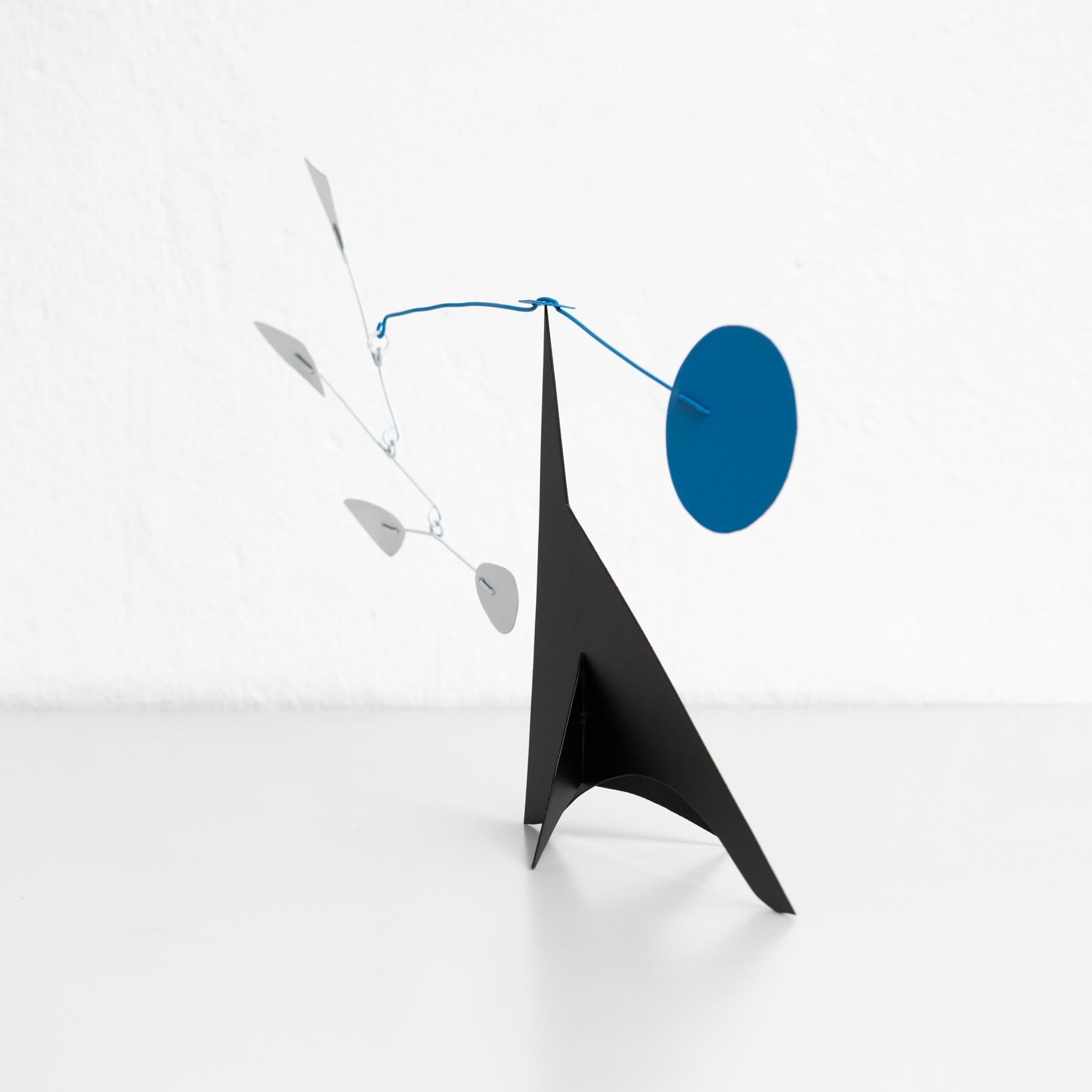 Mesmerizing Kinetics: Iron Sculpture - Painted Motion and Color 2