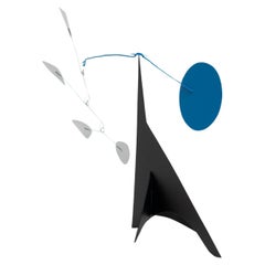 Mesmerizing Kinetics: Iron Sculpture - Painted Motion and Color