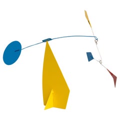 Mesmerizing Kinetics: Iron Sculpture - Painted Motion and Color