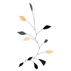 Mesmerizing Kinetics: Iron Sculpture - Painted Motion and Color