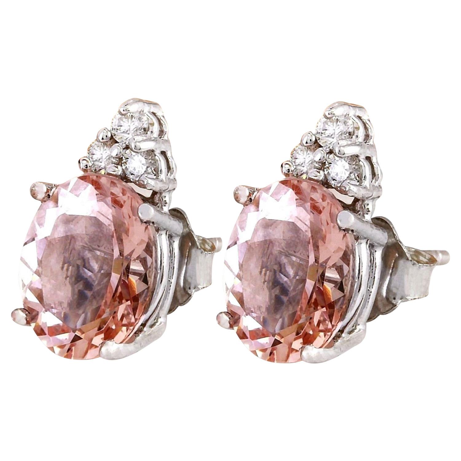 Introducing our stunning 14K Solid White Gold Diamond Earrings featuring a breathtaking 3.20 Carat Natural Morganite gemstone. These elegant studs, designed with sophistication in mind, showcase a mesmerizing oval-shaped Morganite weighing 3.08