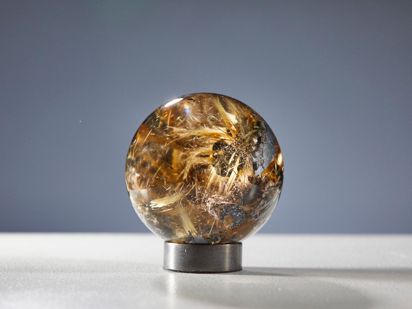 Mesmerizing Quartz Sphere with Golden Rutile Inclusions For Sale 4