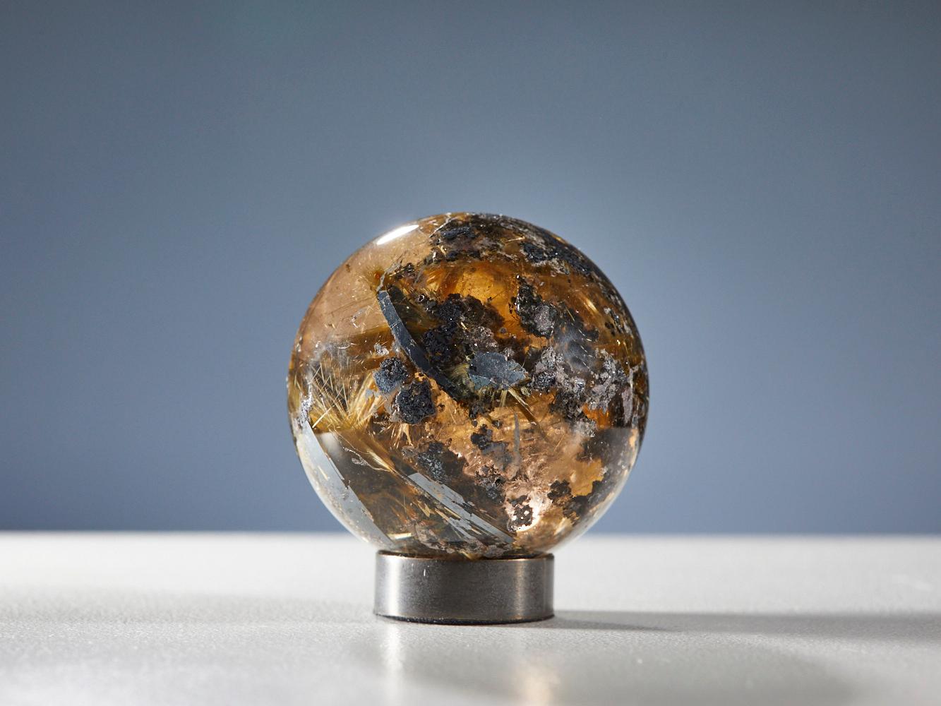 Mesmerizing Quartz Sphere with Golden Rutile Inclusions For Sale 6