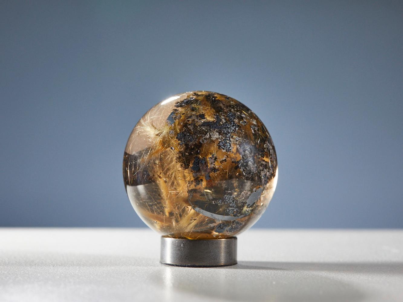 Brazilian Mesmerizing Quartz Sphere with Golden Rutile Inclusions For Sale