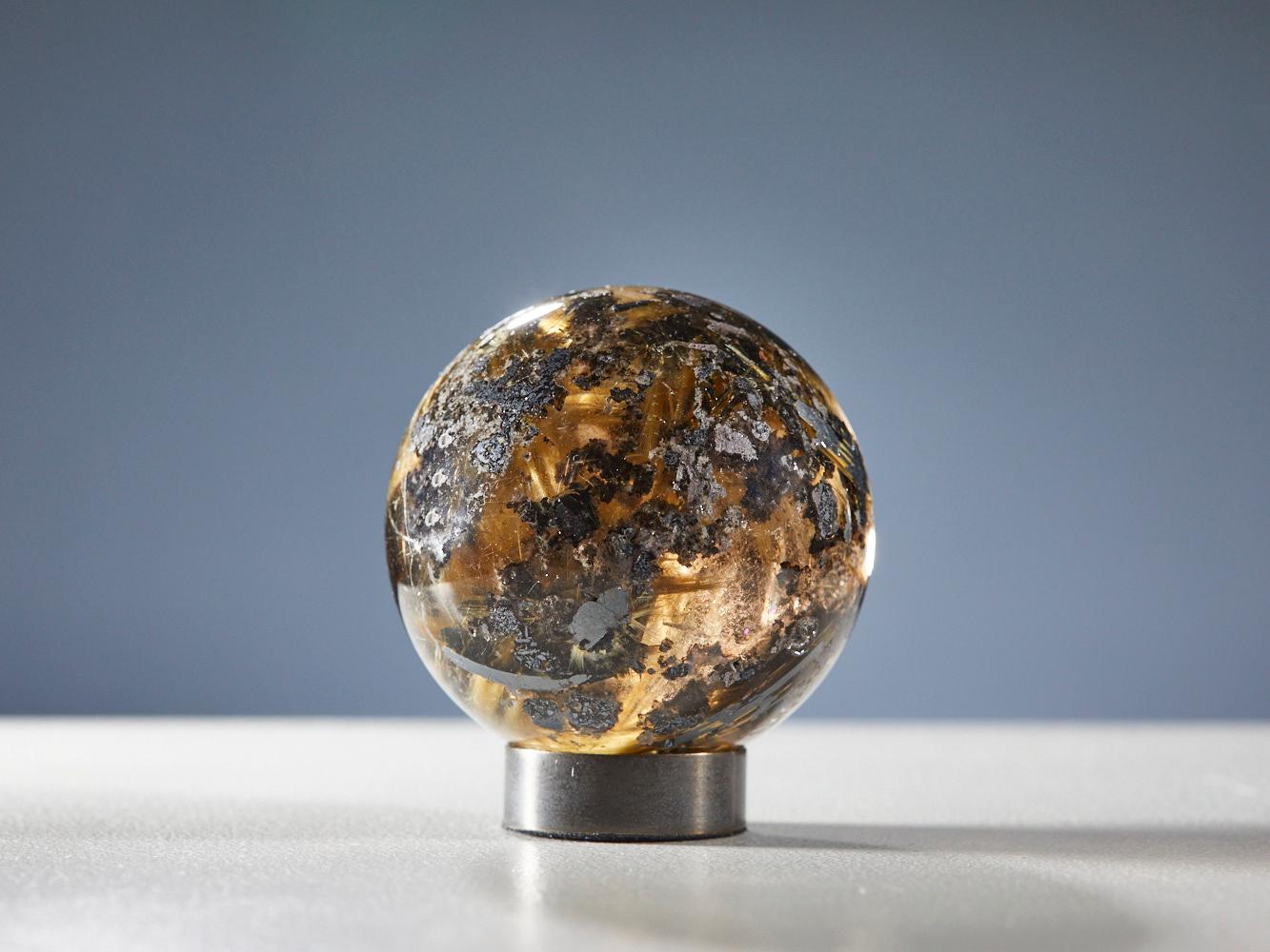 Mesmerizing Quartz Sphere with Golden Rutile Inclusions In Excellent Condition For Sale In London, GB