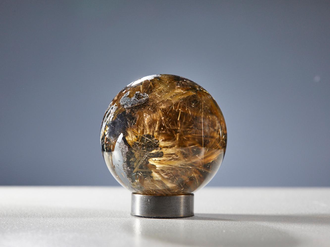 Mesmerizing Quartz Sphere with Golden Rutile Inclusions For Sale 1