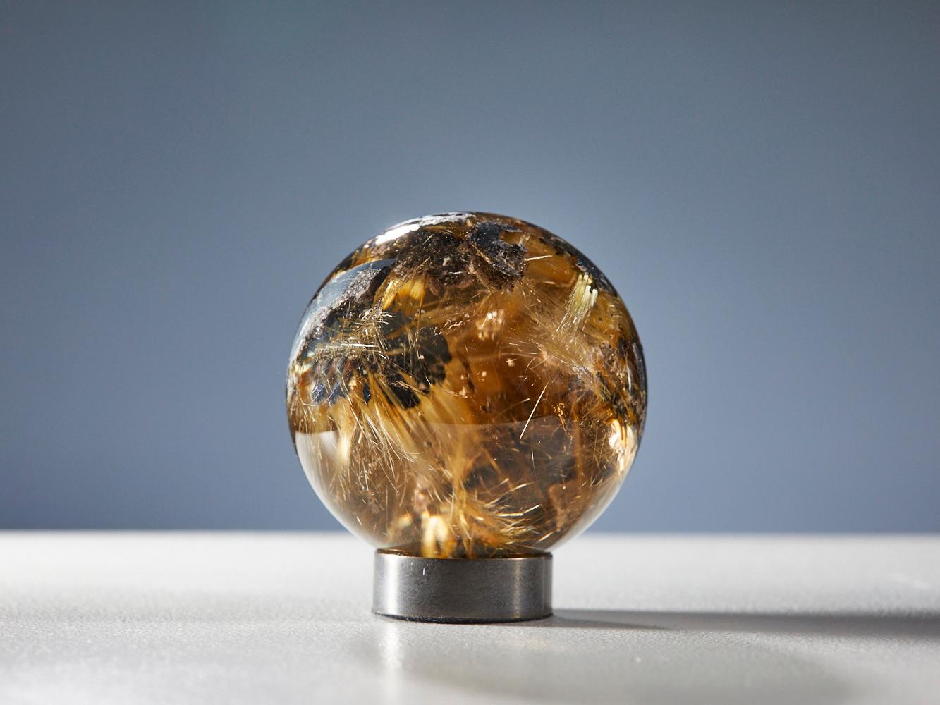 Mesmerizing Quartz Sphere with Golden Rutile Inclusions For Sale 2