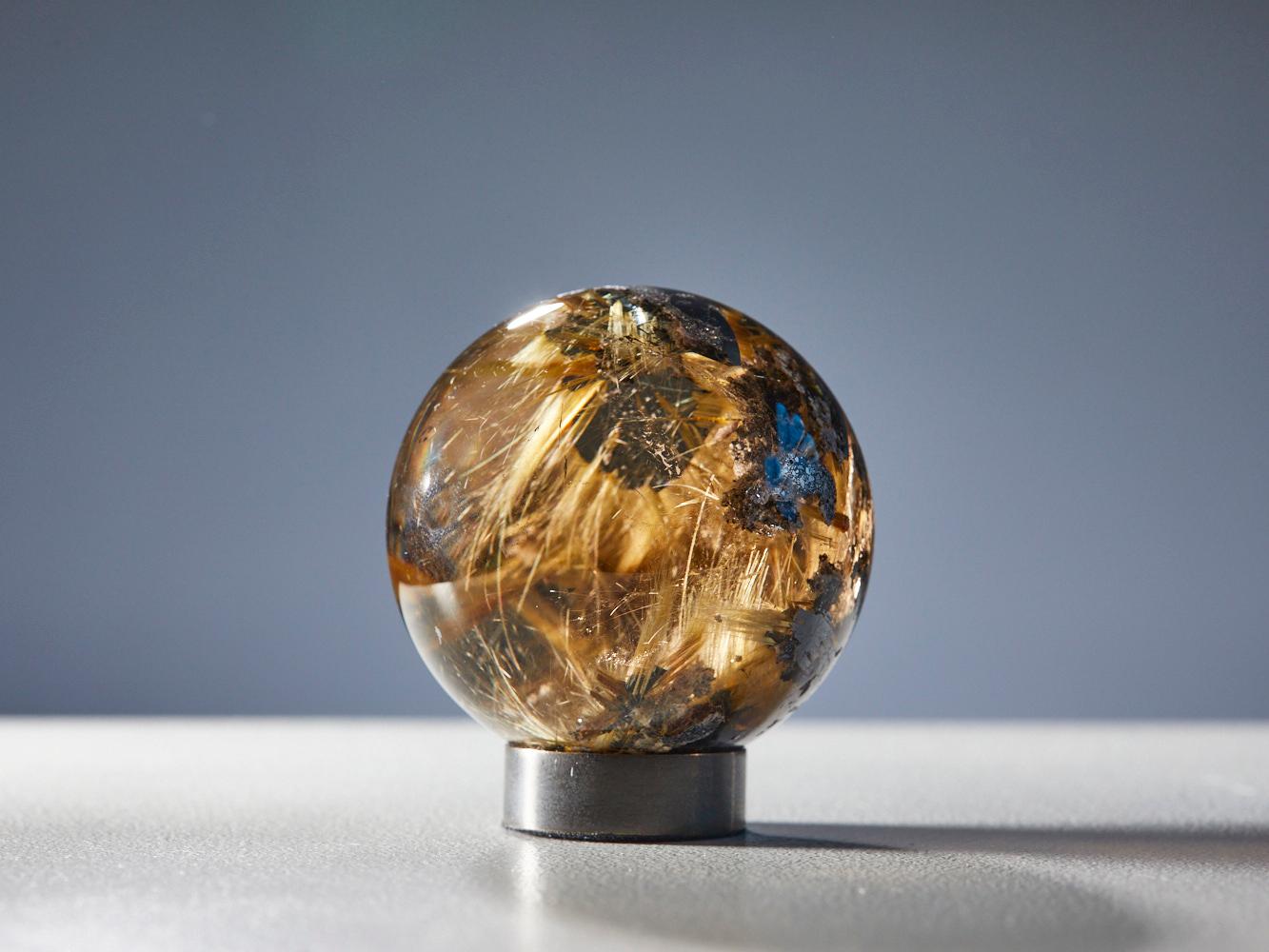 Mesmerizing Quartz Sphere with Golden Rutile Inclusions For Sale 3