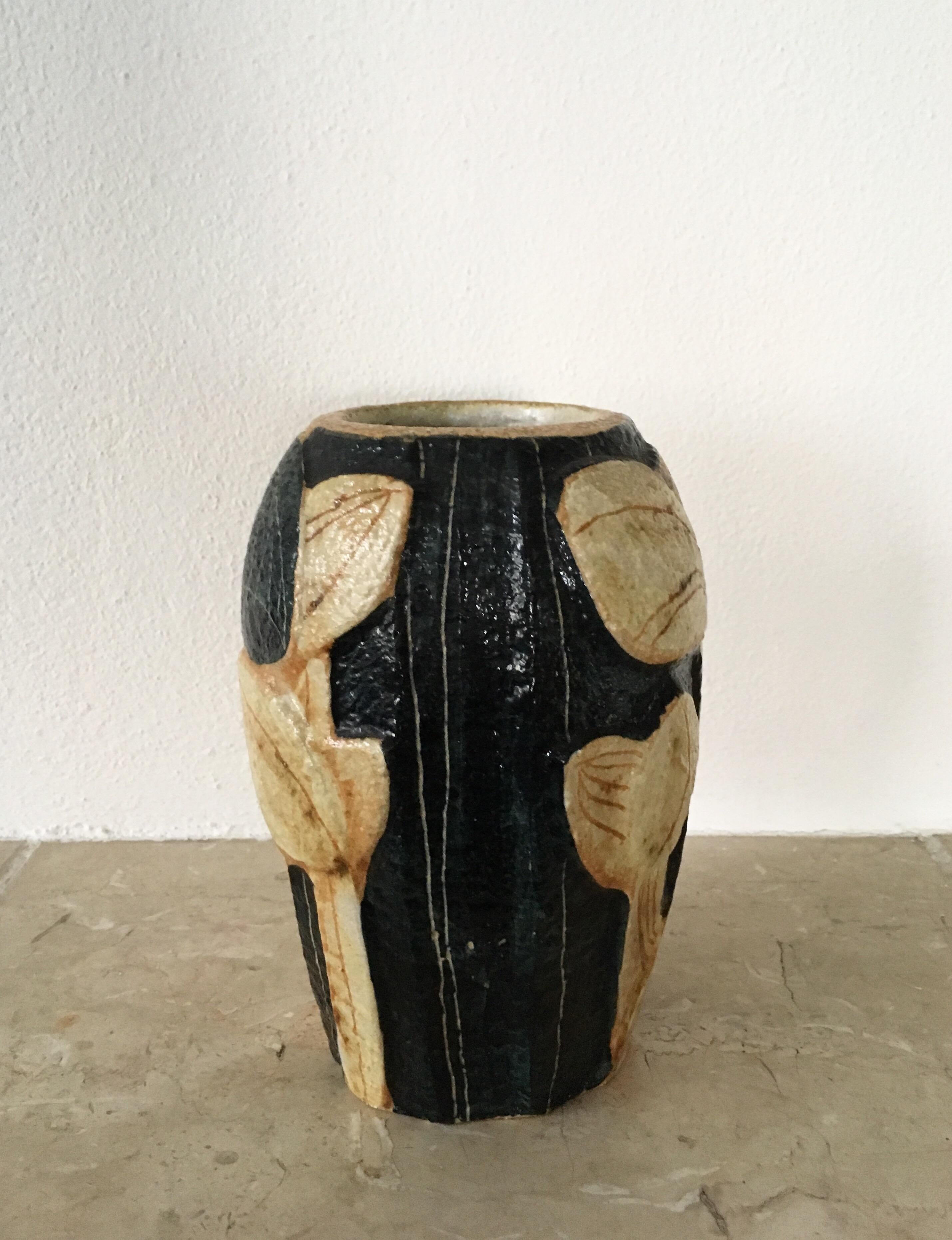 Stunning and rarely seen Scandinavian Mid-Century Modern handmade stoneware vase by Noomi Backhausen for Danish Søholm Stentøj. Hand painted in basic colors. Signed. Very good vintage condition. NOW TEMPORARY DISCOUNT PROMO CODE AVAILABLE, SEND