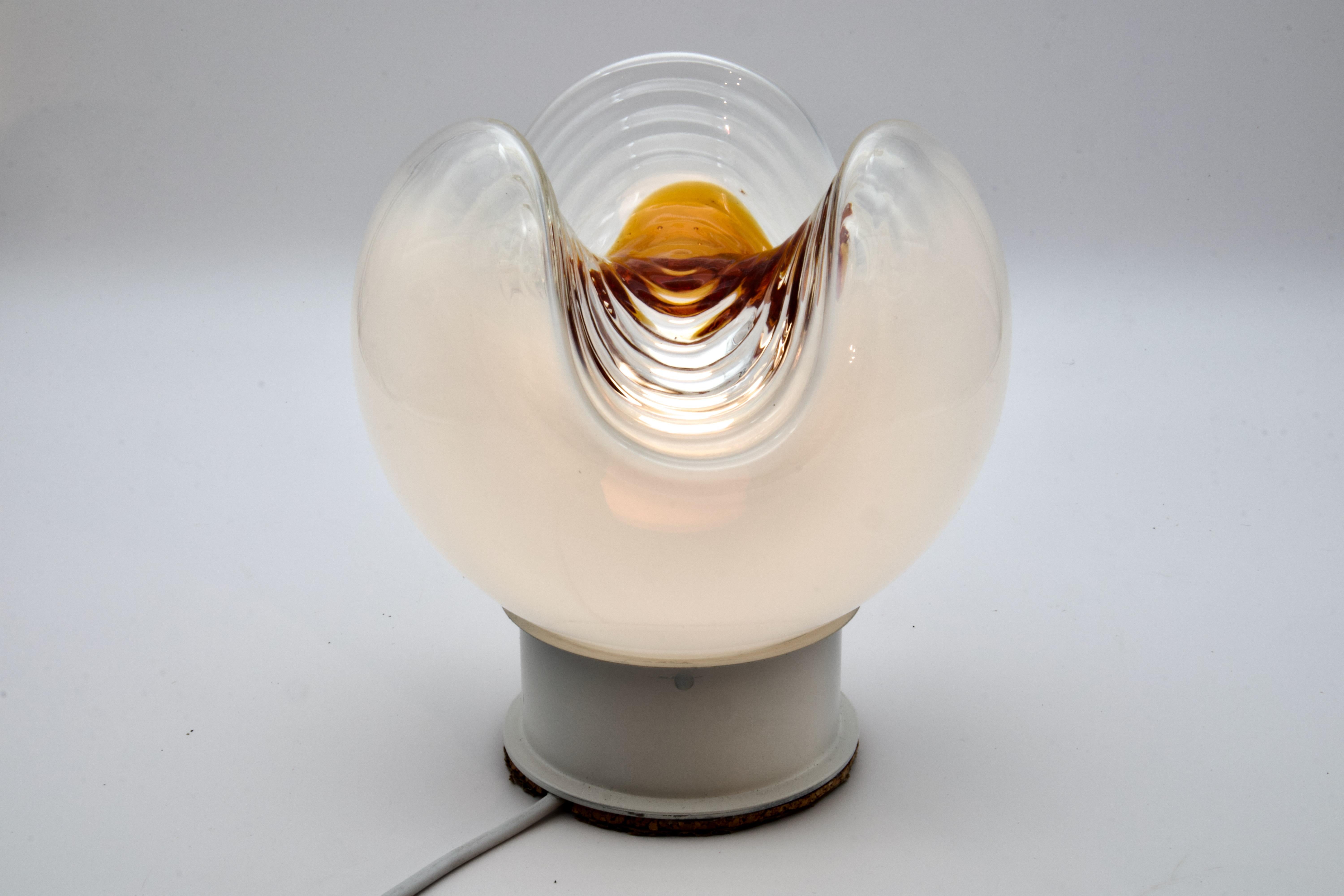 Extraordinary and beautiful, This hand blown Mid-Century Modern Murano art glass large table lamp or floor lamp was made by Mazzega, Italy in the 1970s. It was designed by Carlo Nason and / or Toni Zuccheri. The lamp is suitable as a table lamp or a