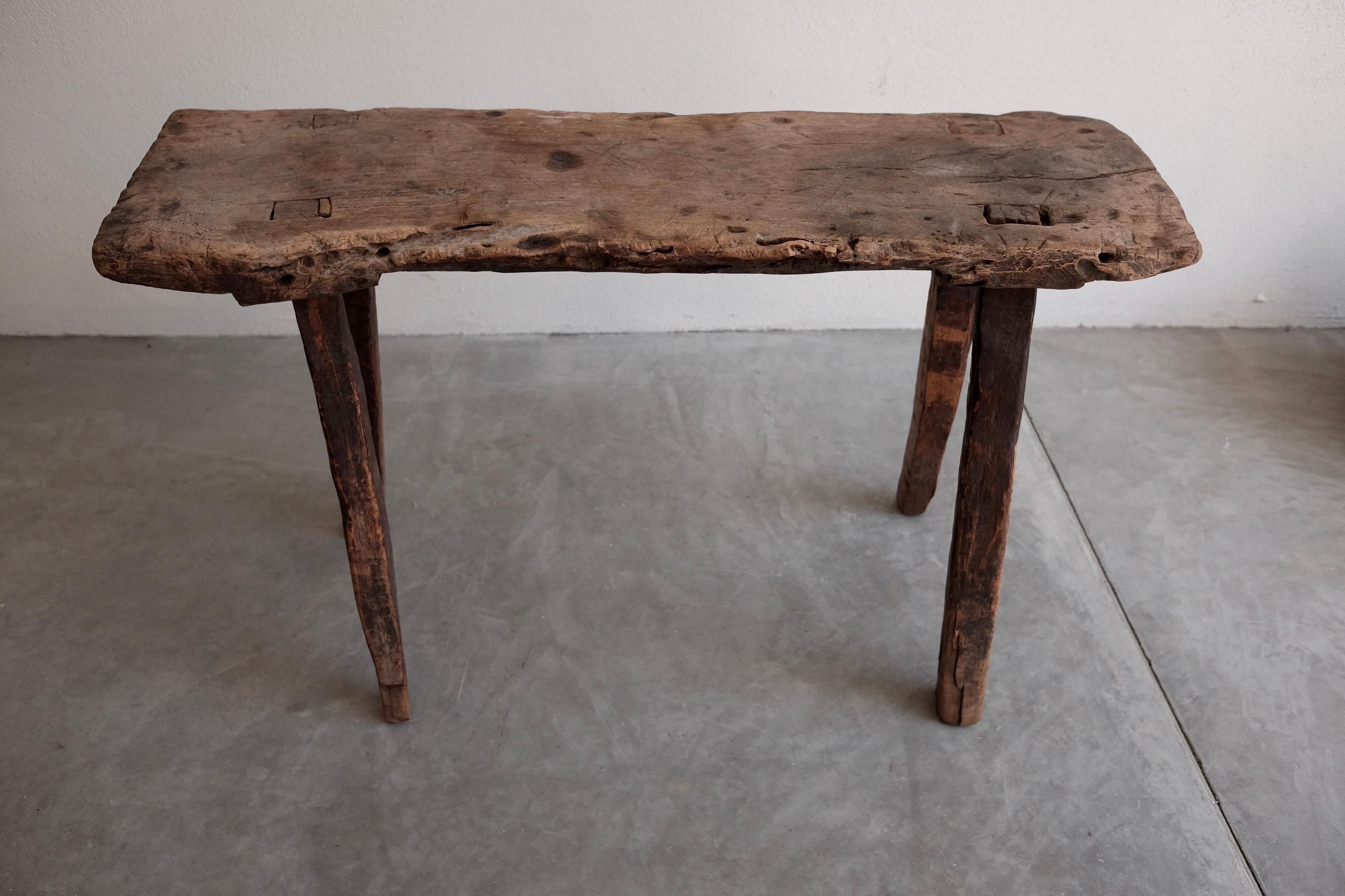 Old, nicely worn mesquite bench from San Felipe, Guanajuato.