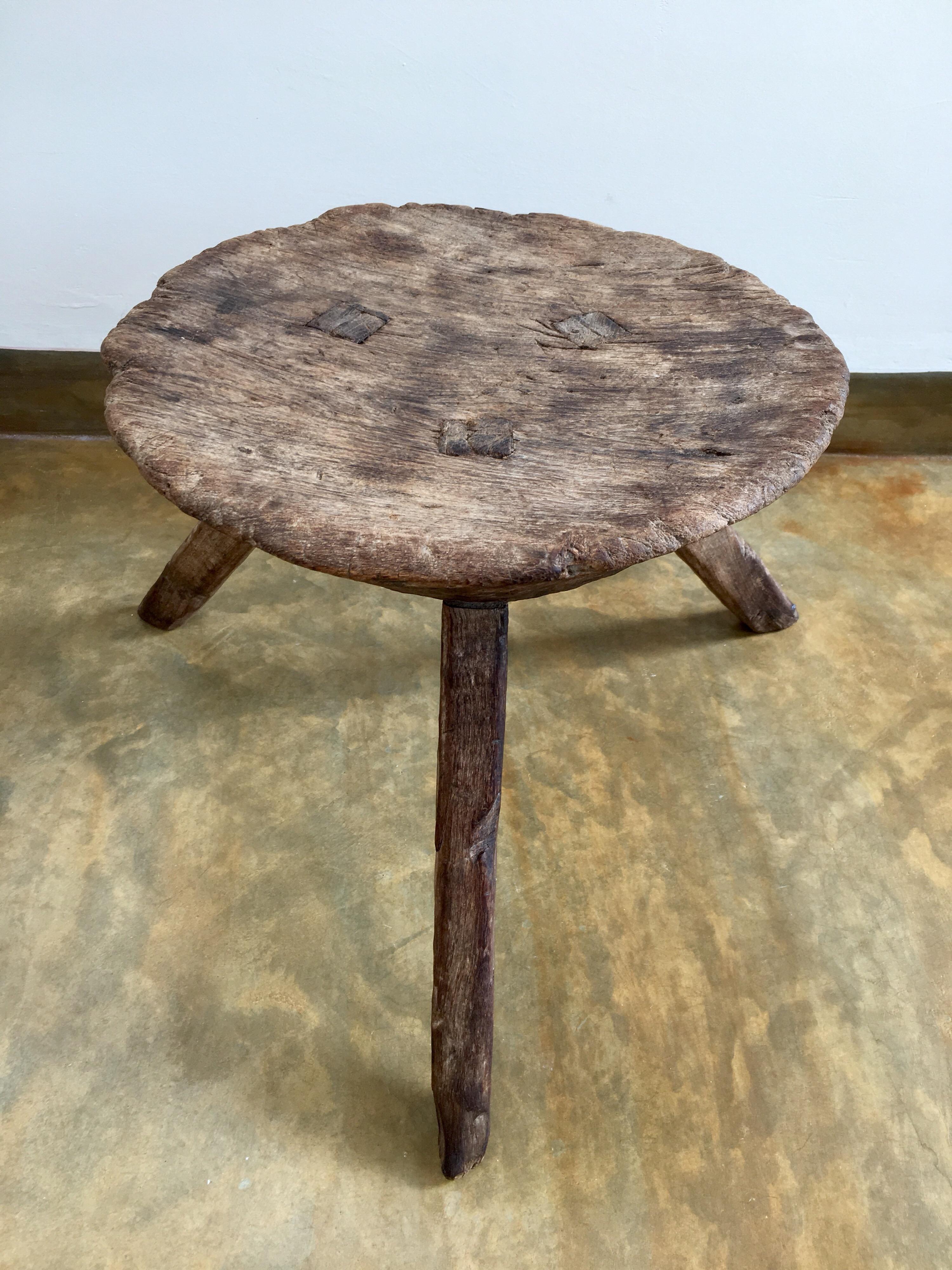 Three-legged mesquite stool from San Luis Potosi, Mexico. Sturdy, completely intact. Beautiful patina. 18