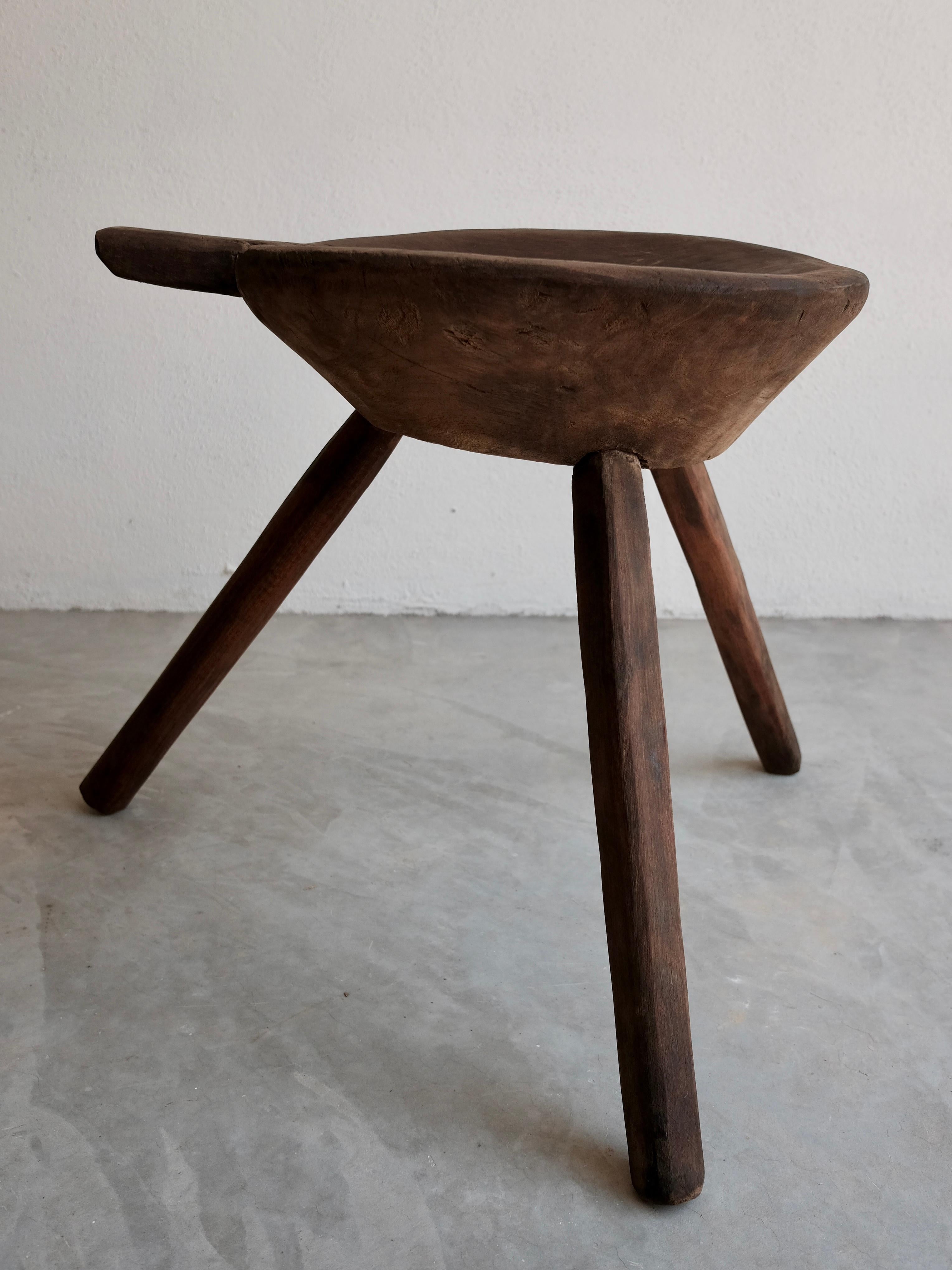 Mesquite work stool from Villa de Zaragoza, San Luis Potosi, Mexico. Dark appearance is due to the exposure of the wood burning stove nearby. Unusually large stool for the region.