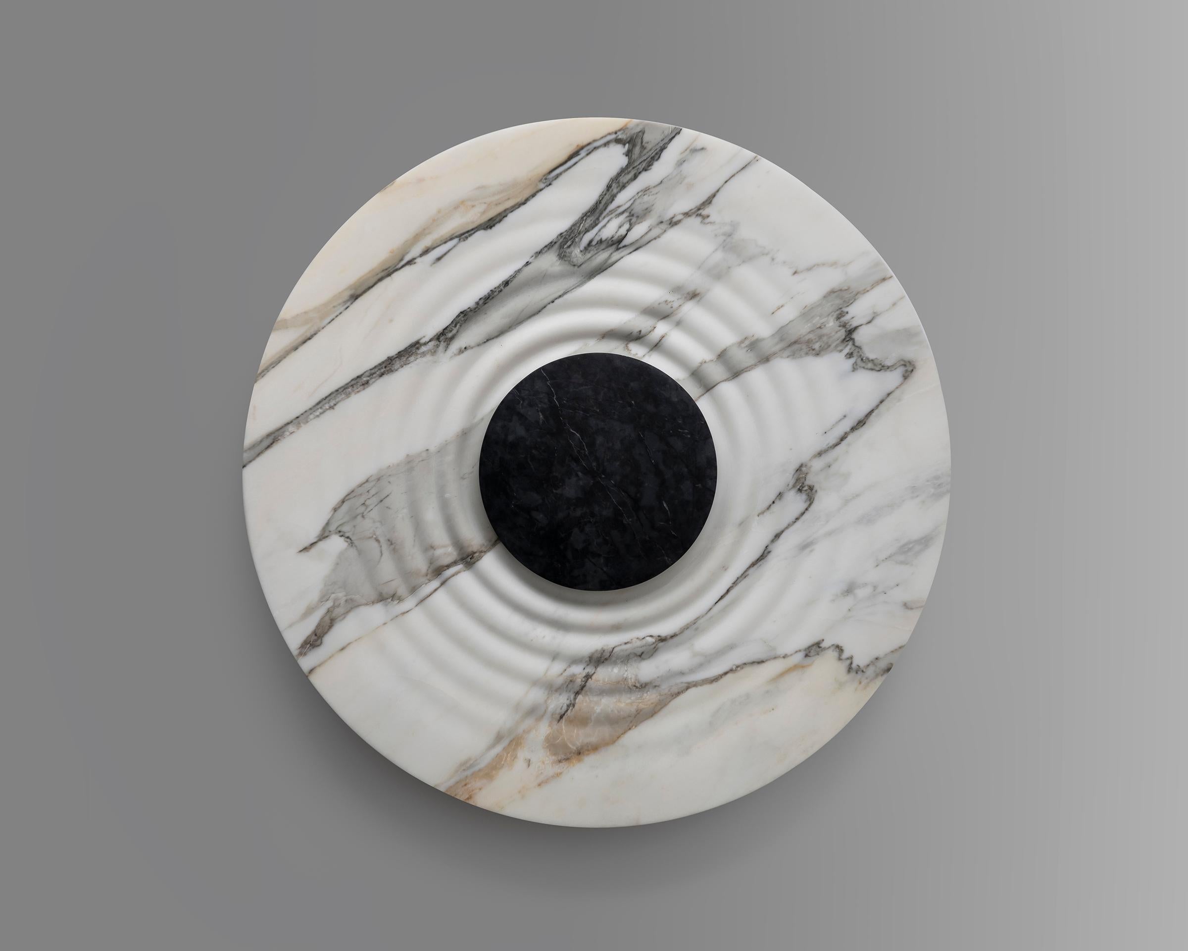 Messier Marble M38 Sconce by Etamorph
Dimensions: Ø 38 x D 10 cm.
Materials: Calacata Marble and Black Matter stone.

Available in Ø 50 and Ø 38 cm. All our lamps can be wired according to each country. If sold to the USA it will be wired for the