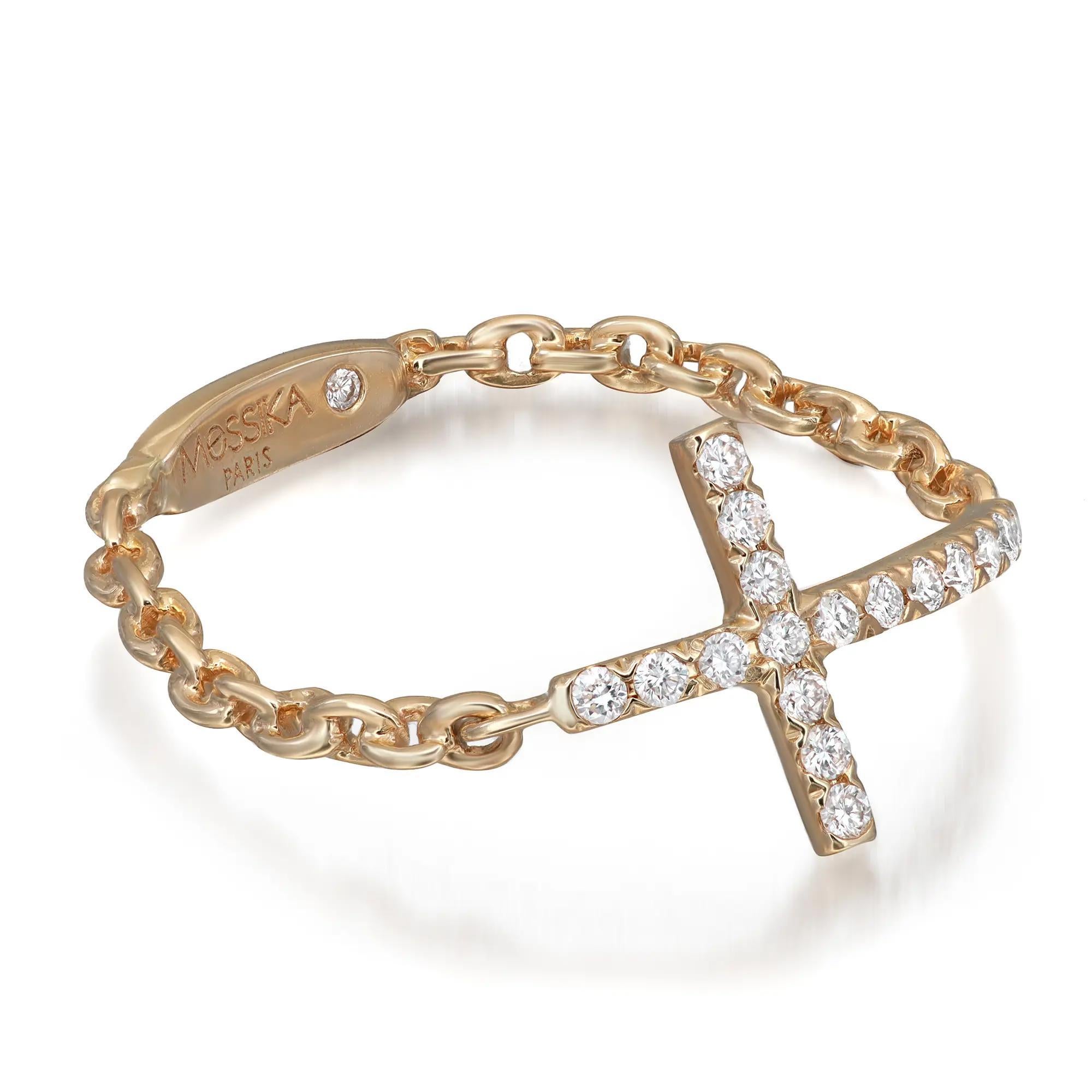 Modern and delicate, Messika Croix Sur Chaine diamond ring crafted in 18K yellow gold. This ring features pave set round brilliant cut diamonds weighing 0.11 carat, set in a cross shape shank. Diamond color G and VS clarity. It's stackable and easy