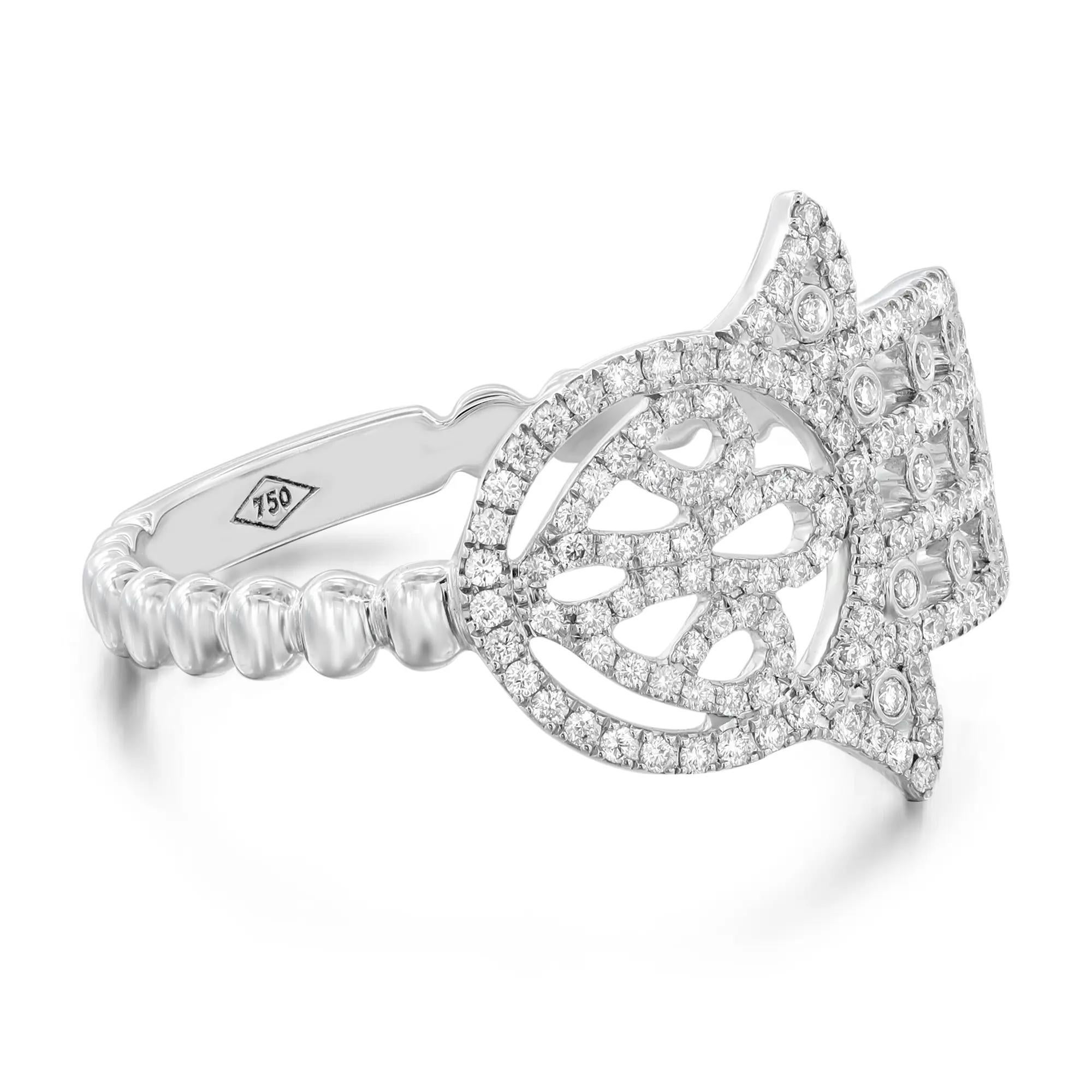 This unique Messika Faith diamond band ring features a Hamsa sign studded with pave set round brilliant cut diamonds weighing 0.24 carat, designed to protect and ward off negative energies. Diamond color G and clarity VS. Crafted in 18K white gold.