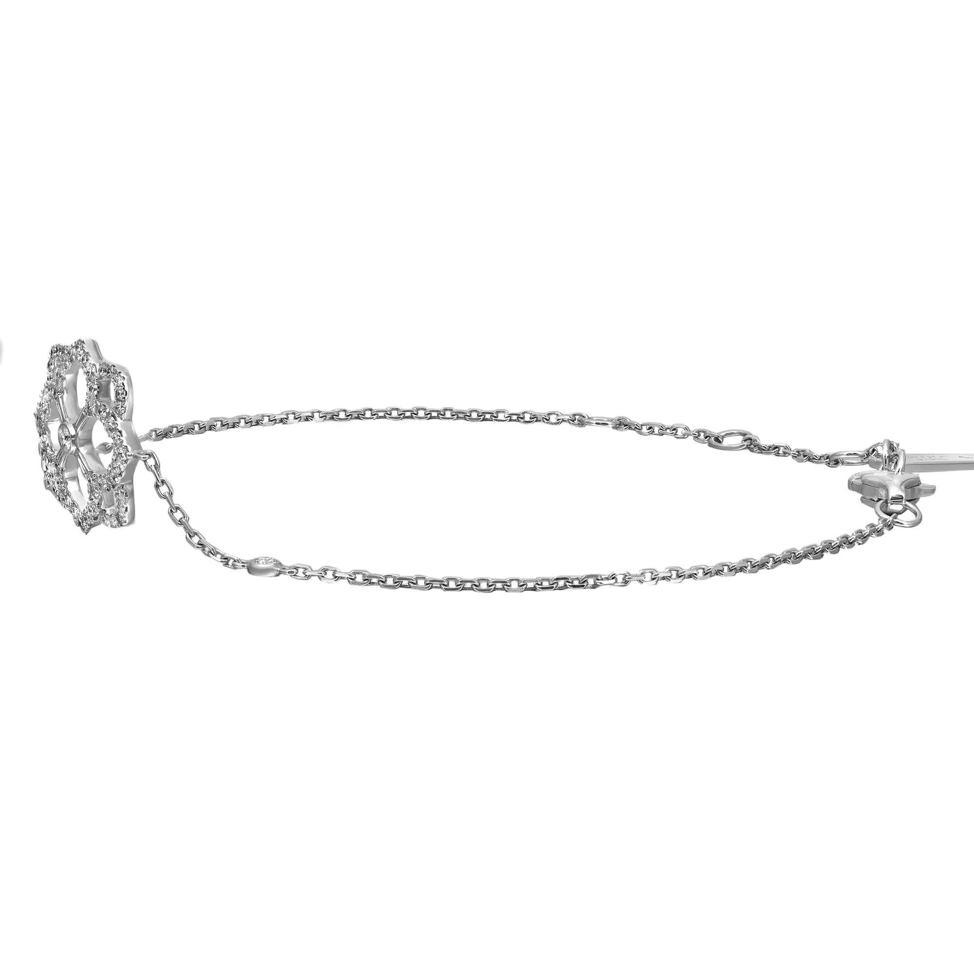 Délicat mais robuste, ce bracelet à chaîne en diamants Messika Eden est parfait pour votre look de tous les jours. Whiting en or blanc 18 carats poli. Il est empilable et facile à combiner. Ce bracelet présente un motif floral serti de diamants