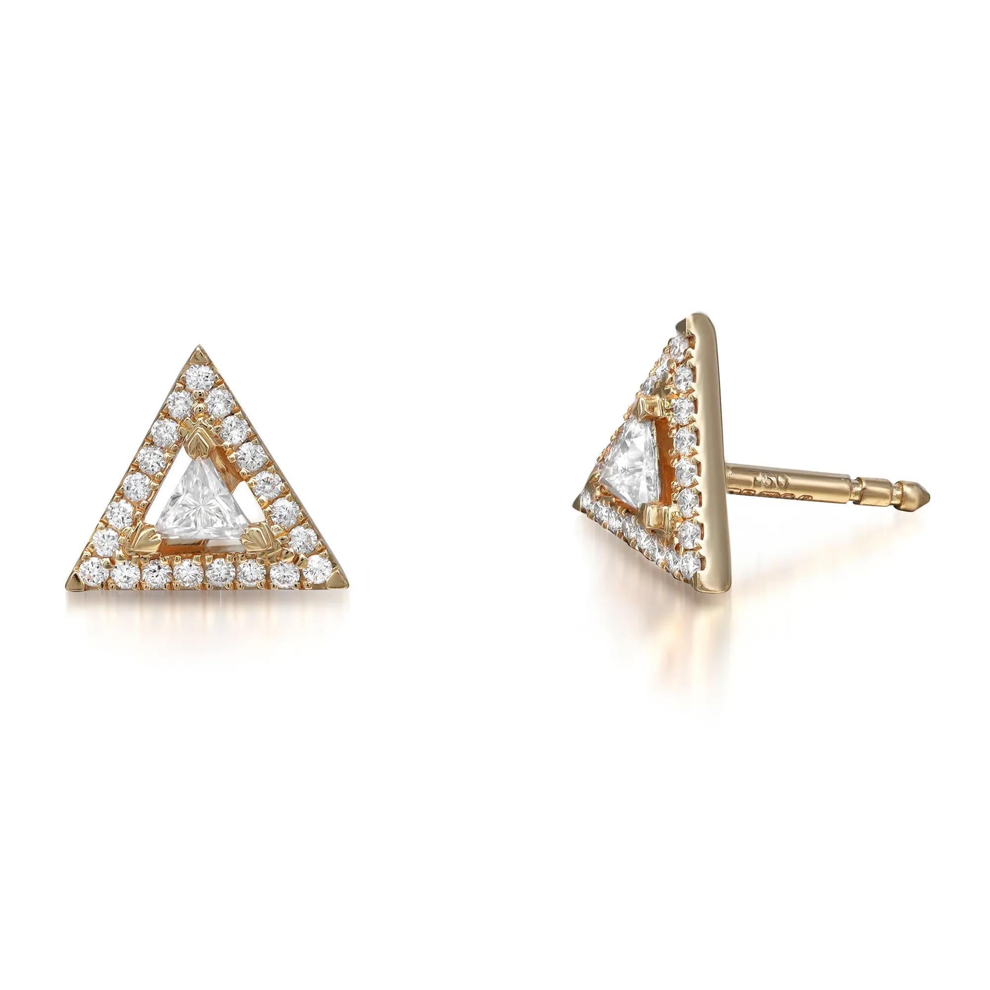 Brighten up your ear game with these sparkling Messika Thea diamond stud earrings. Crafted in 18K yellow gold. Features center prong set triangular diamond with round cut diamond halo weighing 0.32 carat. Diamond color G and clarity VS. Chic,