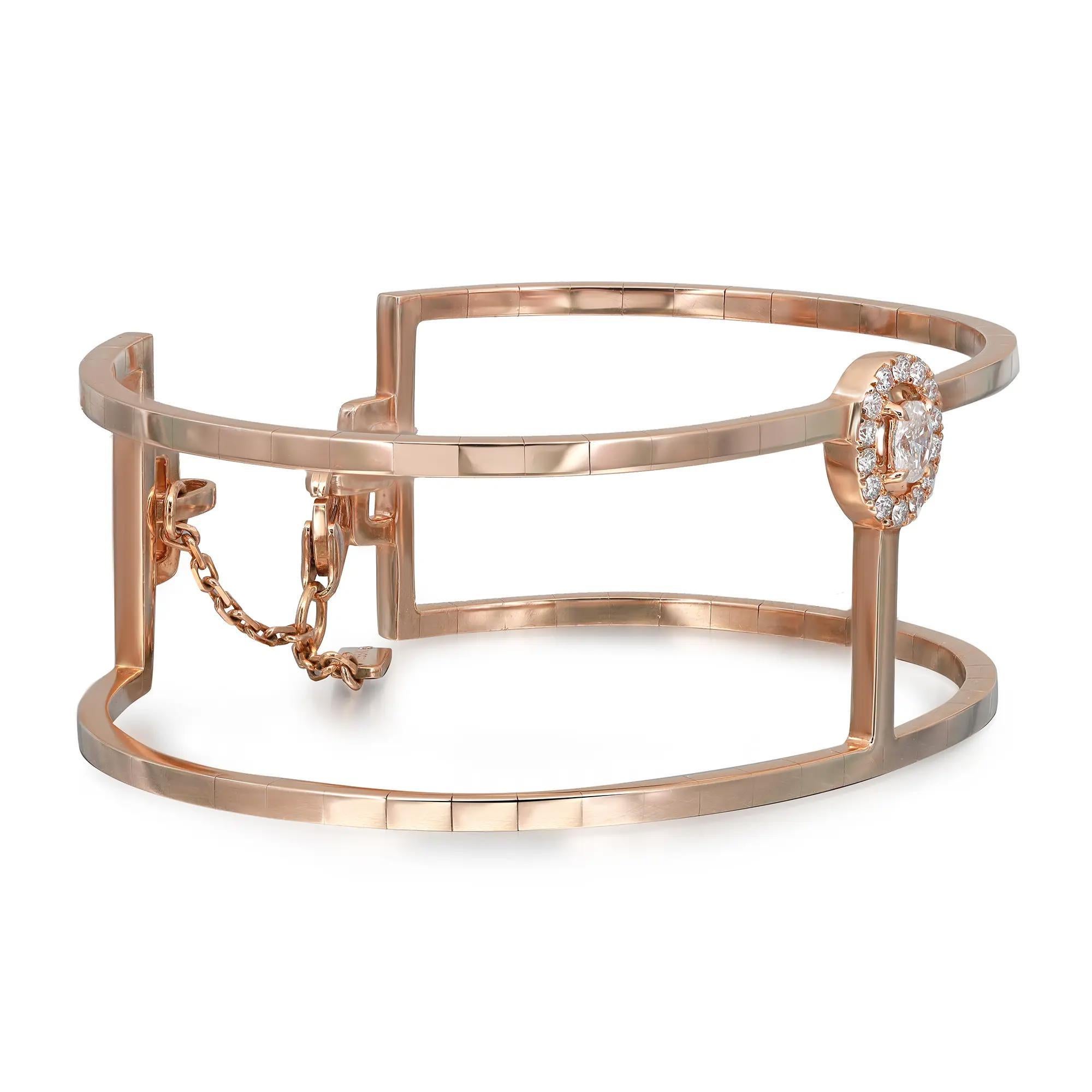 Add a touch of sparkle to your wrist with this gorgeous Messika Manch Glam'Azone diamond 2 rows cuff bracelet. Crafted in lustrous 18K rose gold. It features center prong set oval cut diamond accented with round brilliant cut diamonds. Total diamond