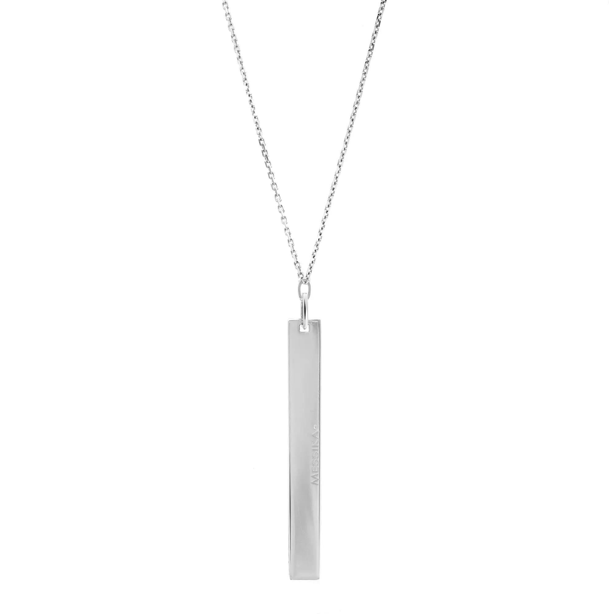This gorgeous Messika Sautoir Kate diamond vertical bar pendant necklace is crafted in highly polished 18K white gold. Featuring pave set round brilliant cut diamonds encrusted in a vertical row with a diamond studded oval link. Diamond quality: G