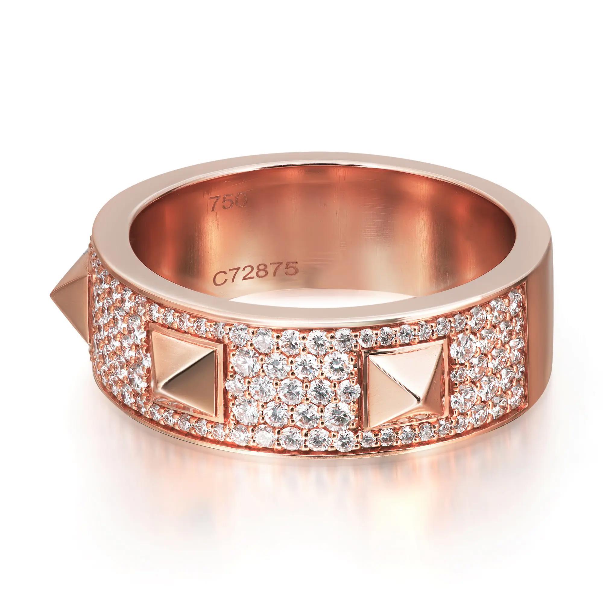 Bold and contemporary, Messika Spiky diamond band ring. Crafted in lustrous 18K rose gold. It features pave set round brilliant cut diamonds studded halfway through the band with three spikes giving it a unique look. Total diamond weight: 0.61