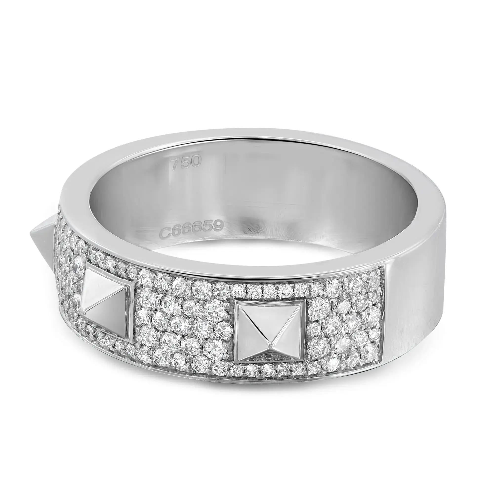 Bold and contemporary, Messika Spiky diamond band ring. Crafted in lustrous 18K white gold. It features pave set round brilliant cut diamonds studded halfway through the band with three spikes giving it a unique look. Total diamond weight: 0.61