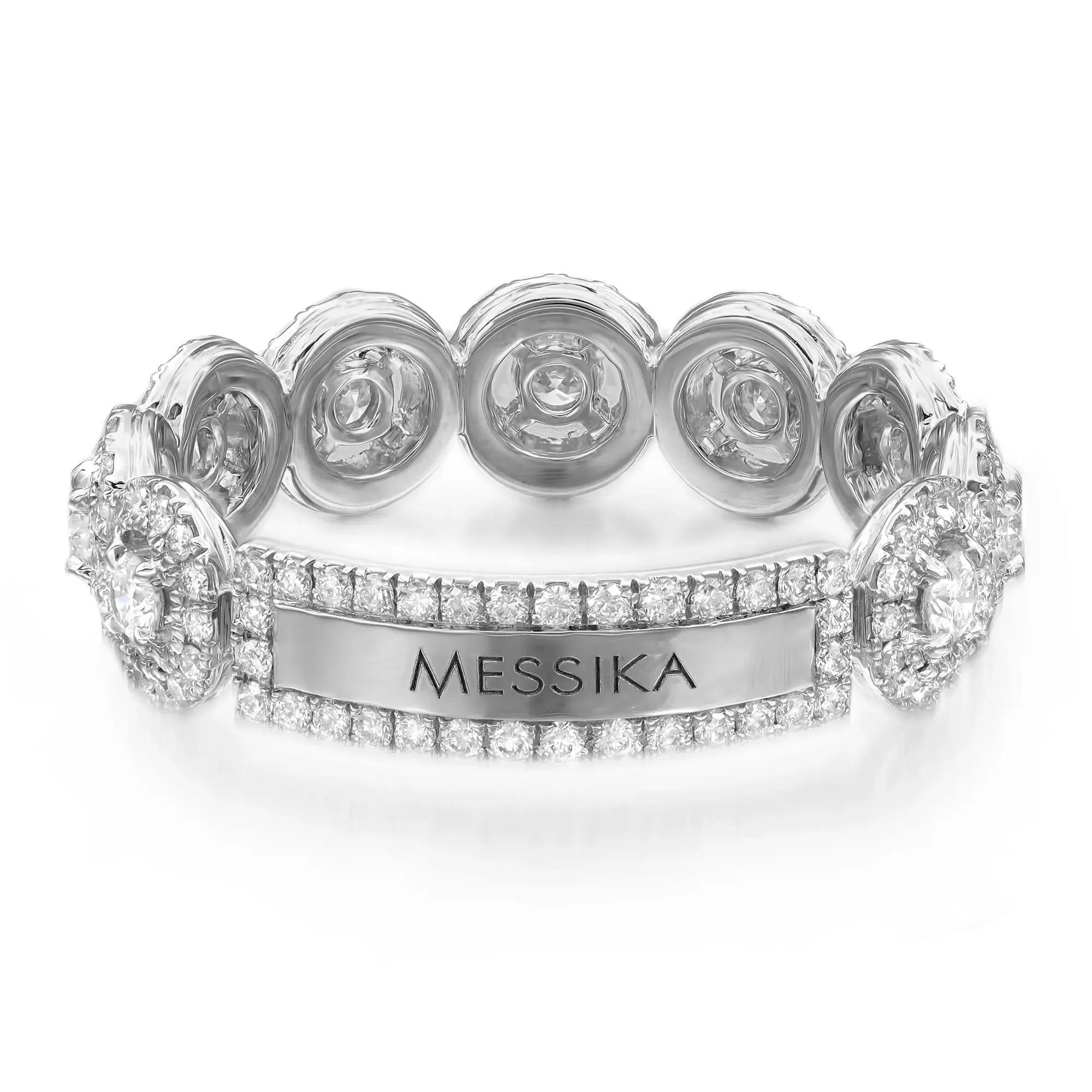 Walk with grace with this sparkling Messika All Joy diamond ring. Crafted in 18K White Gold, it features prong set round brilliant cut diamonds in the center accented with diamond halo. Total diamond weight: 0.87 carat. Diamond quality: color G and