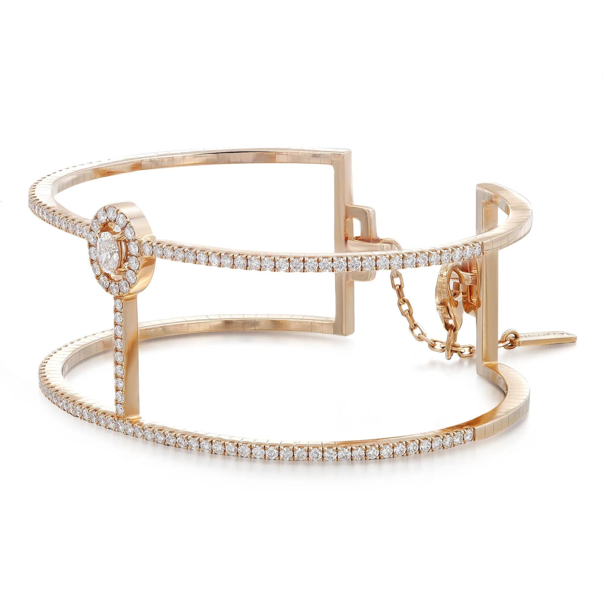 Walk with grace with this gorgeous Messika Manch Glam'Azone diamond 2 rows cuff bracelet. Crafted in lustrous 18K rose gold. It features center prong set oval cut diamond accented with round brilliant cut diamonds halfway through the bracelet. Total