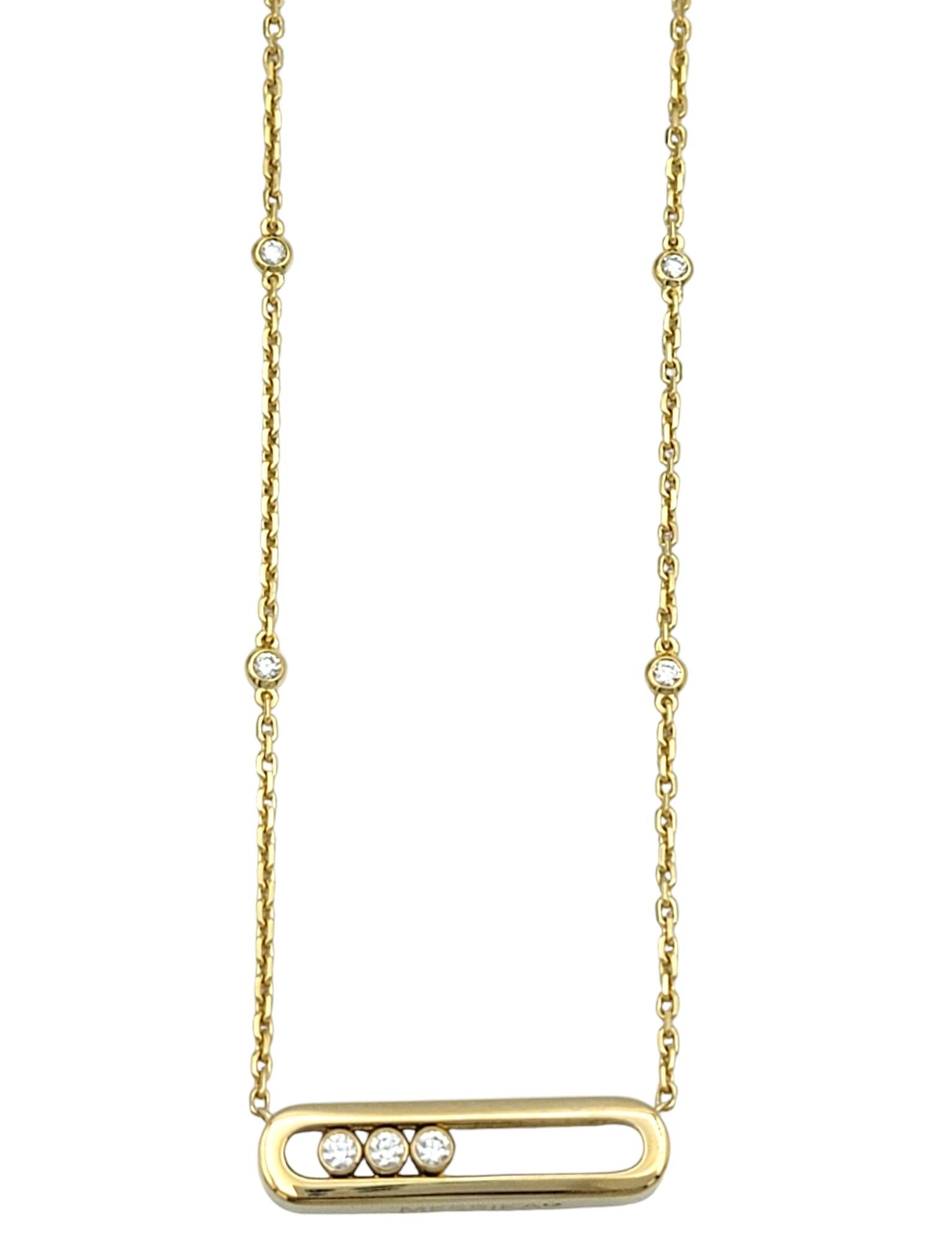 Step into elegance with the mesmerizing craftsmanship of this exquisite necklace by Messika. Crafted in luxurious 18 karat yellow gold, this piece is a testament to fine jewelry artistry. At its center, three dazzling diamond bezels gracefully move